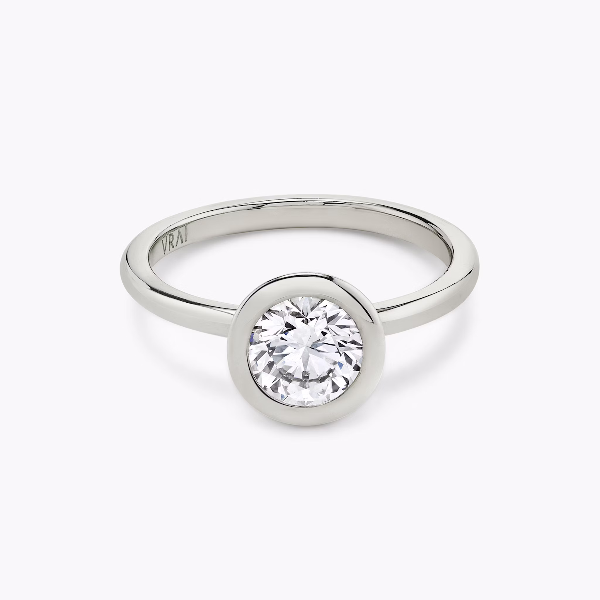 The Signature Bezel | Round Brilliant | Platinum | bandAccent: Plain | caratWeight: other | diamondOrientation: horizontal