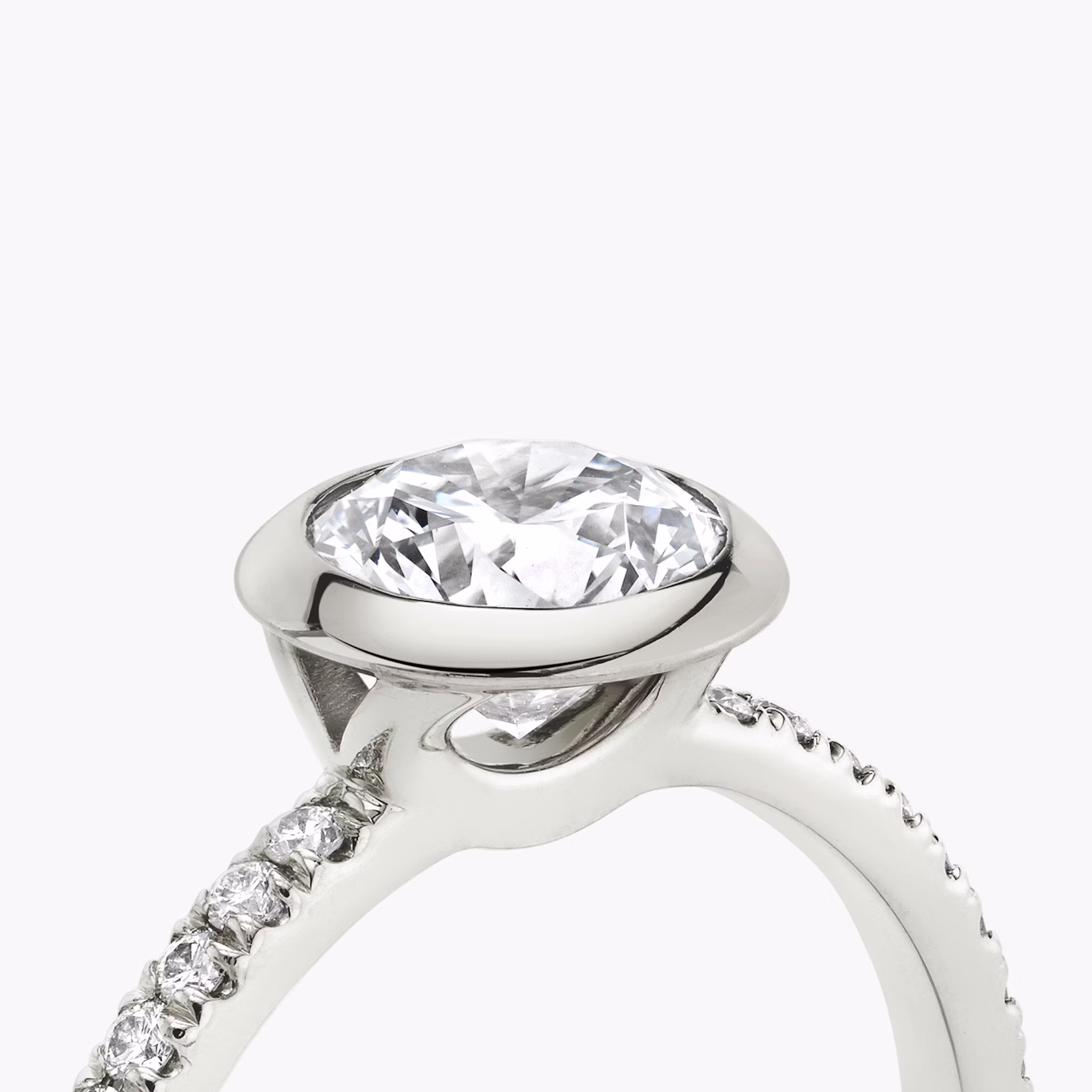 The Signature Bezel | Round Brilliant | 18k | White Gold | bandAccent: Pavé | caratWeight: other | diamondOrientation: vertical