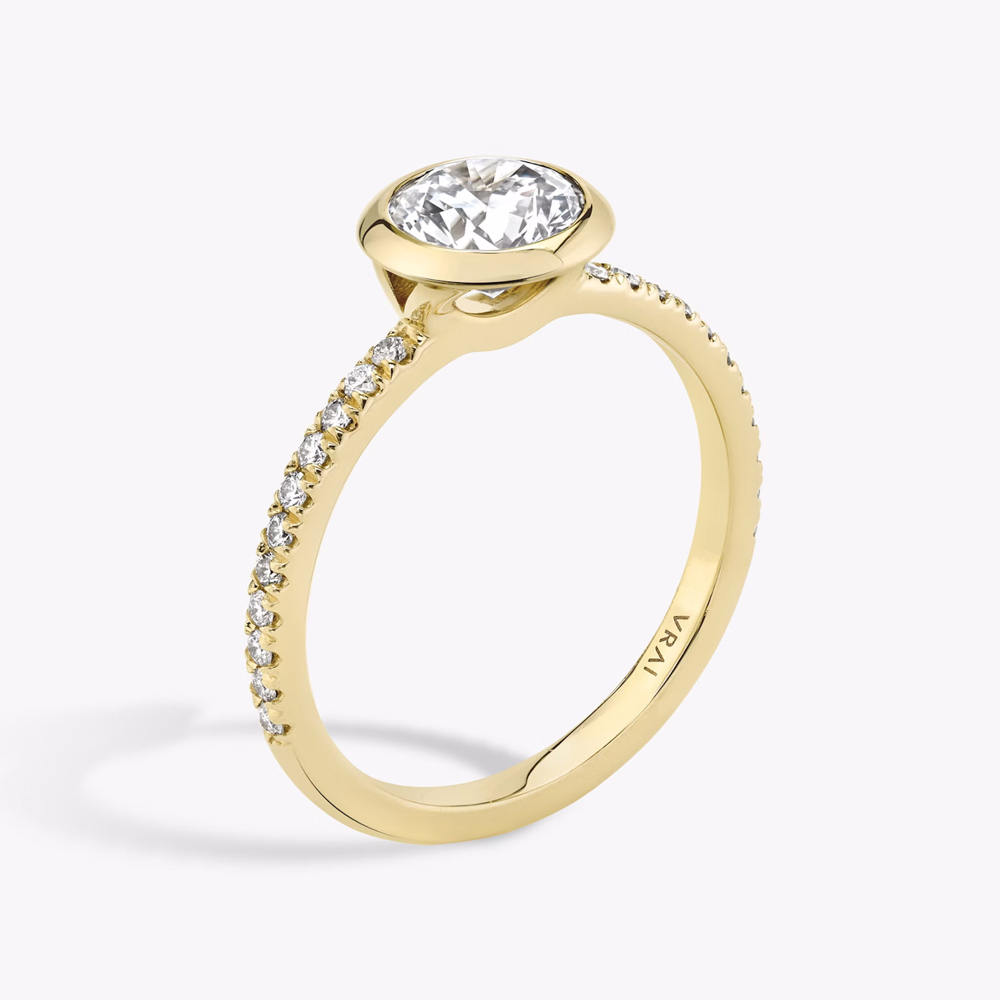 The Signature Bezel | Round Brilliant | 18k | Yellow Gold | bandAccent: Pavé | caratWeight: other | diamondOrientation: vertical
