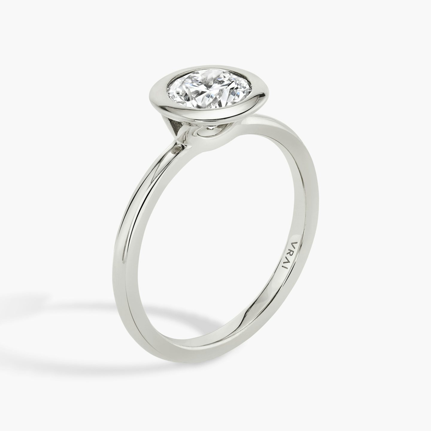 The Signature Bezel | Round Brilliant | Platinum | bandAccent: Plain | caratWeight: 1.0ct | diamondOrientation: vertical