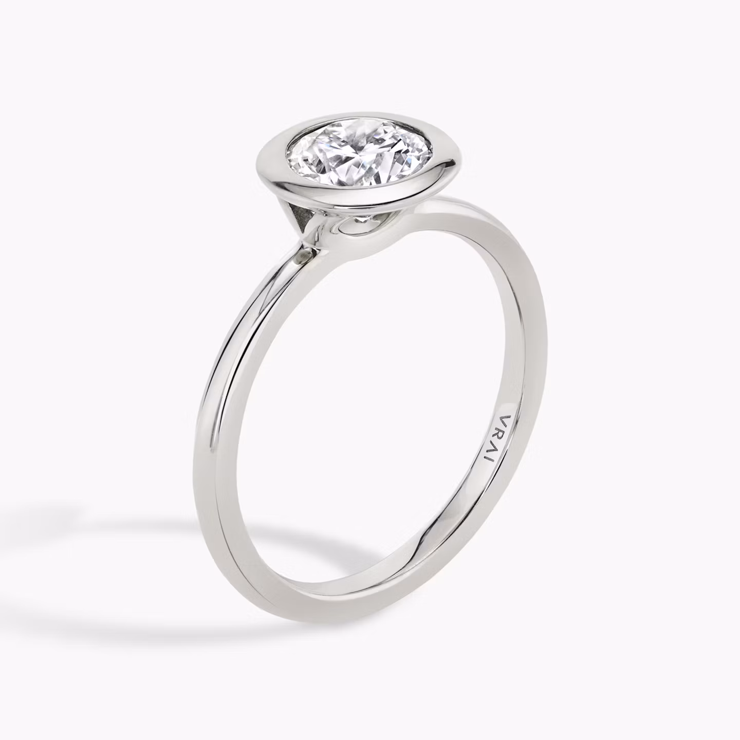 The Signature Bezel | Round Brilliant | 18k | White Gold | bandAccent: Plain | caratWeight: other | diamondOrientation: vertical
