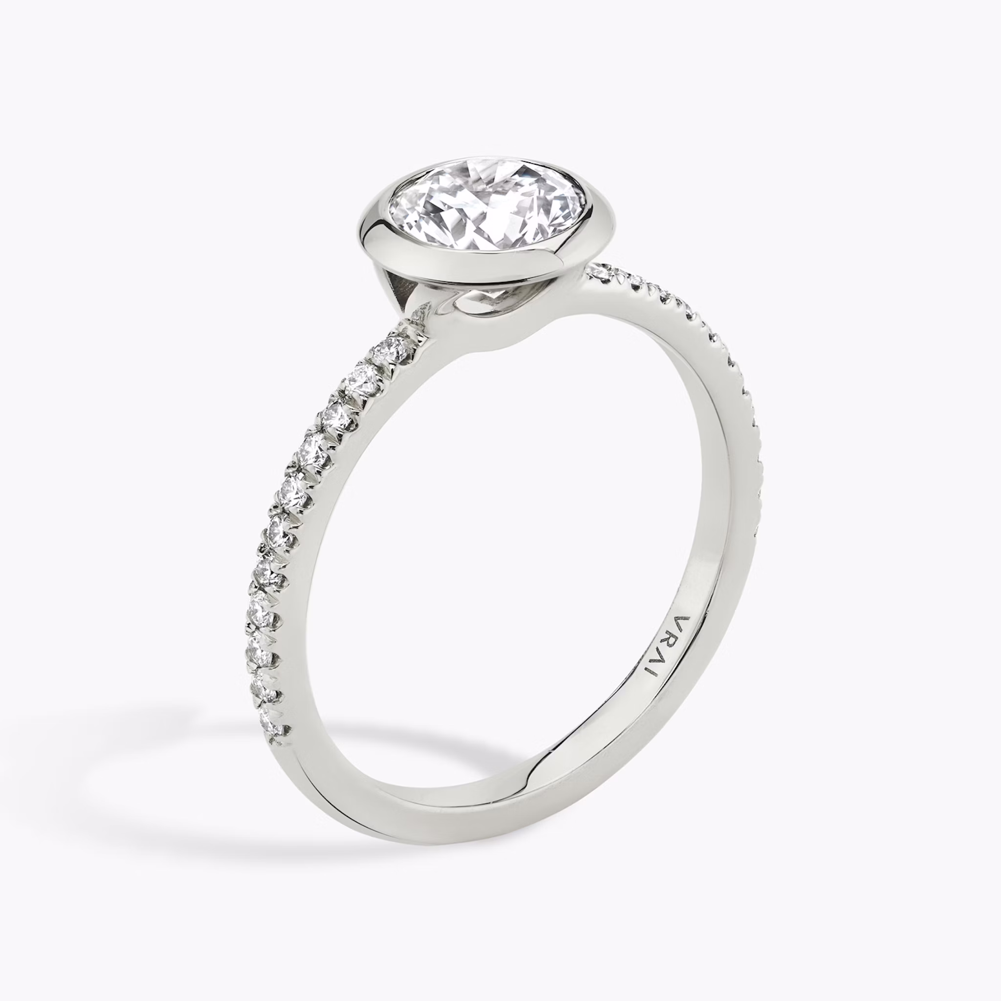 The Signature Bezel | Round Brilliant | 18k | White Gold | bandAccent: Pavé | caratWeight: other | diamondOrientation: vertical