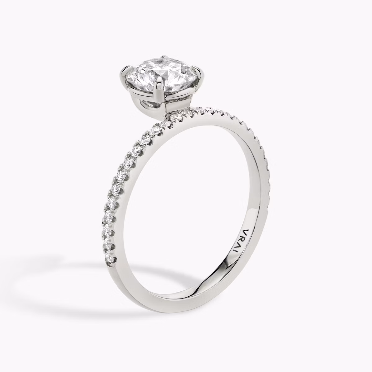 The Hover | Round Brilliant | Platinum | bandAccent: Pavé | caratWeight: 1.5ct | diamondOrientation: vertical