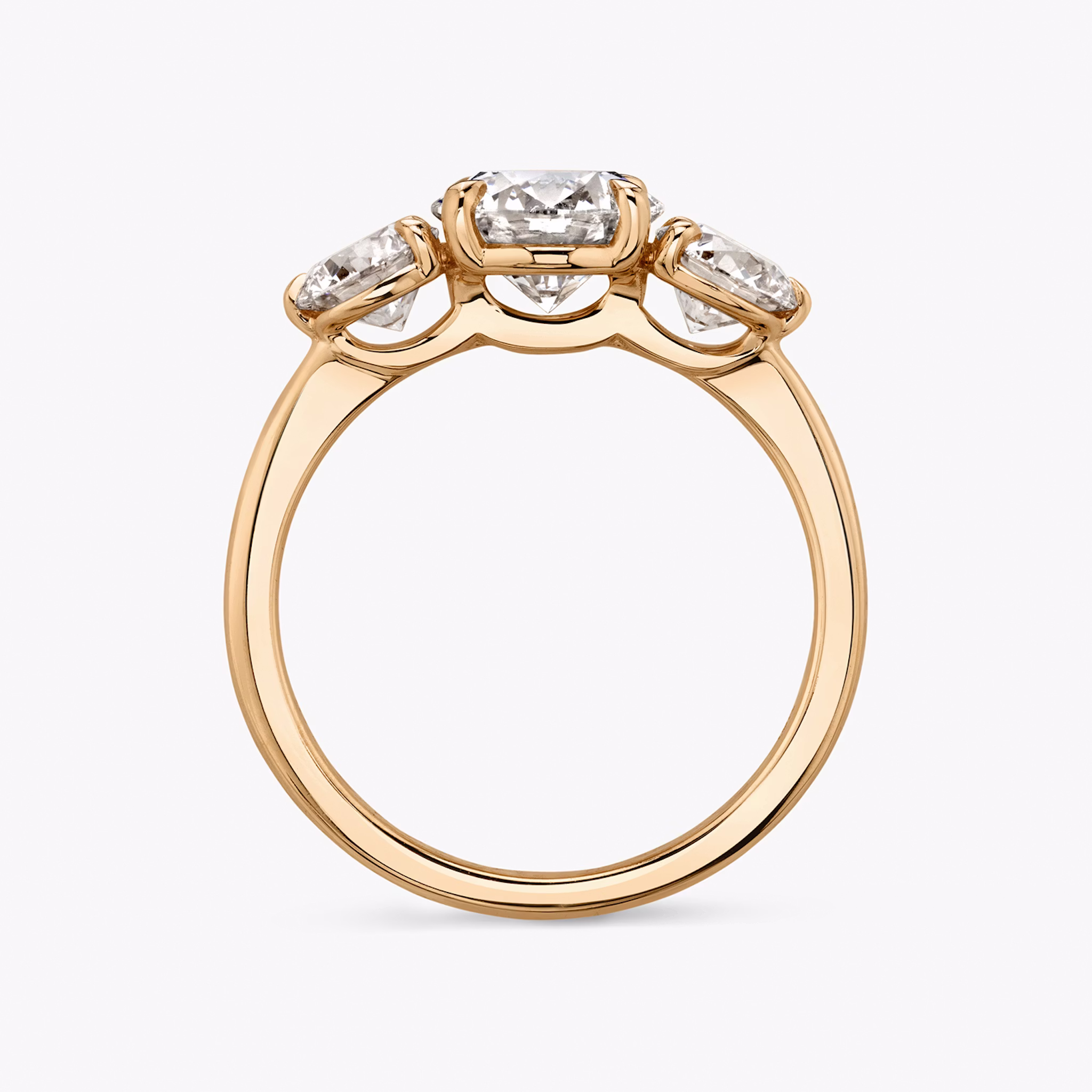The Three Stone | Round Brilliant | 14k | Rose Gold | bandAccent: Plain | caratWeight: other | sideStoneCarat: 0.50ct | sideStoneShape: Round Brilliant | diamondOrientation: vertical
