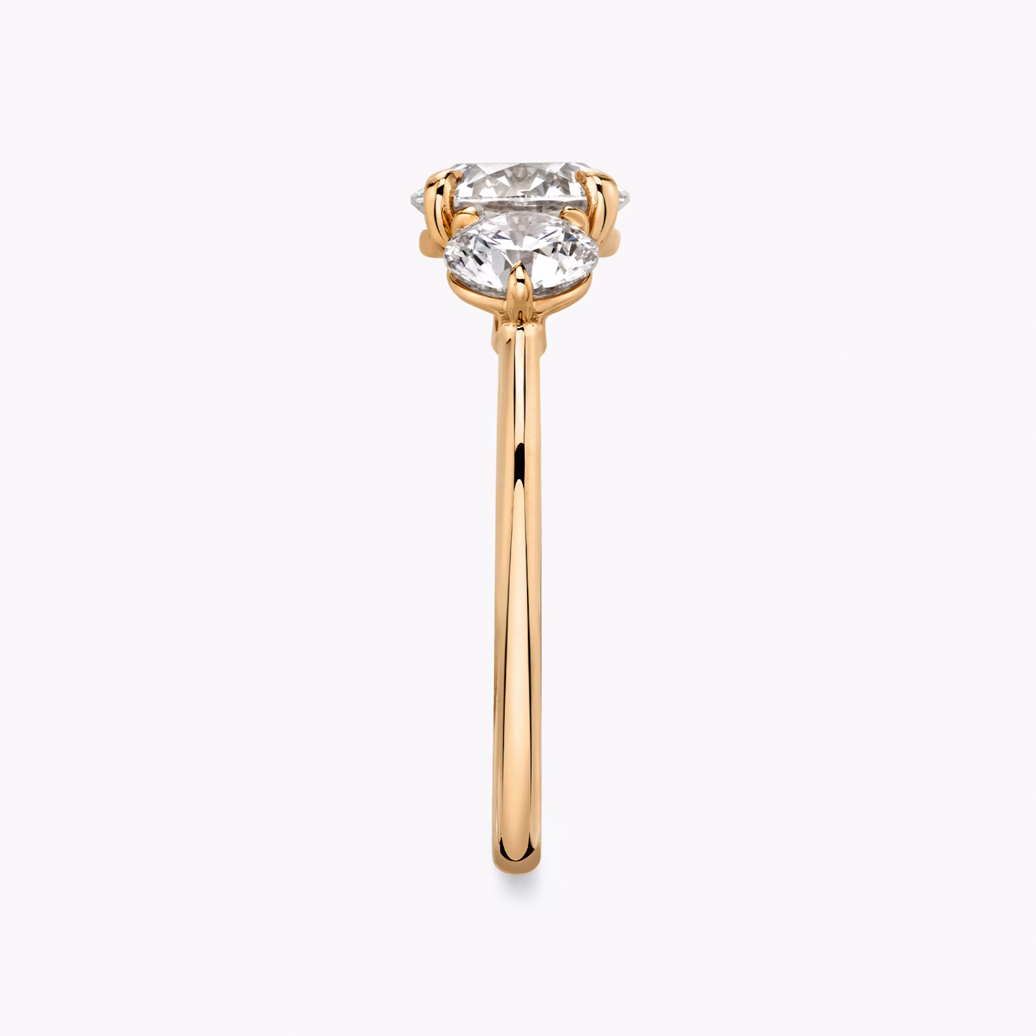 The Three Stone | Round Brilliant | 14k | Rose Gold | bandAccent: Plain | caratWeight: other | sideStoneCarat: 0.50ct | sideStoneShape: Round Brilliant | diamondOrientation: vertical