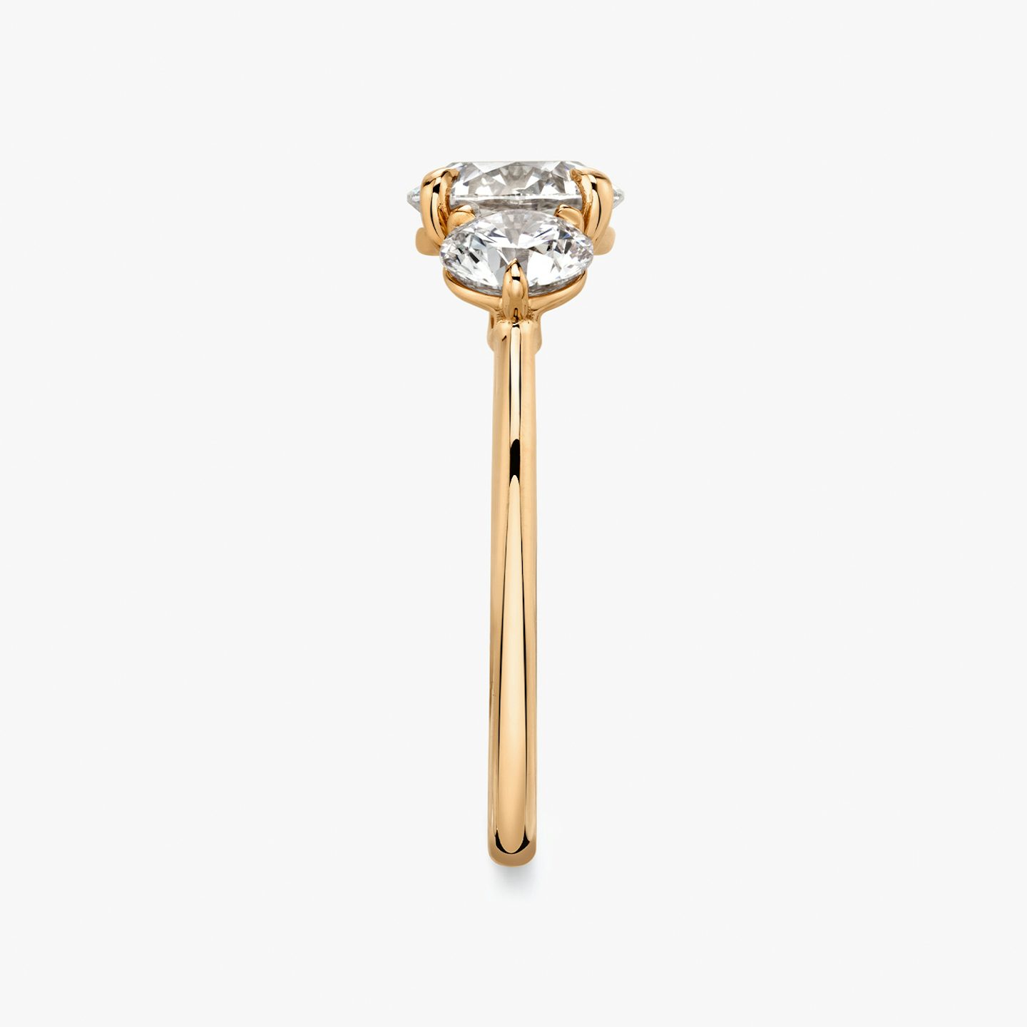 The Three Stone | Round Brilliant | 14k | Rose Gold | bandAccent: Plain | caratWeight: other | sideStoneCarat: 0.50ct | sideStoneShape: Round Brilliant | diamondOrientation: vertical