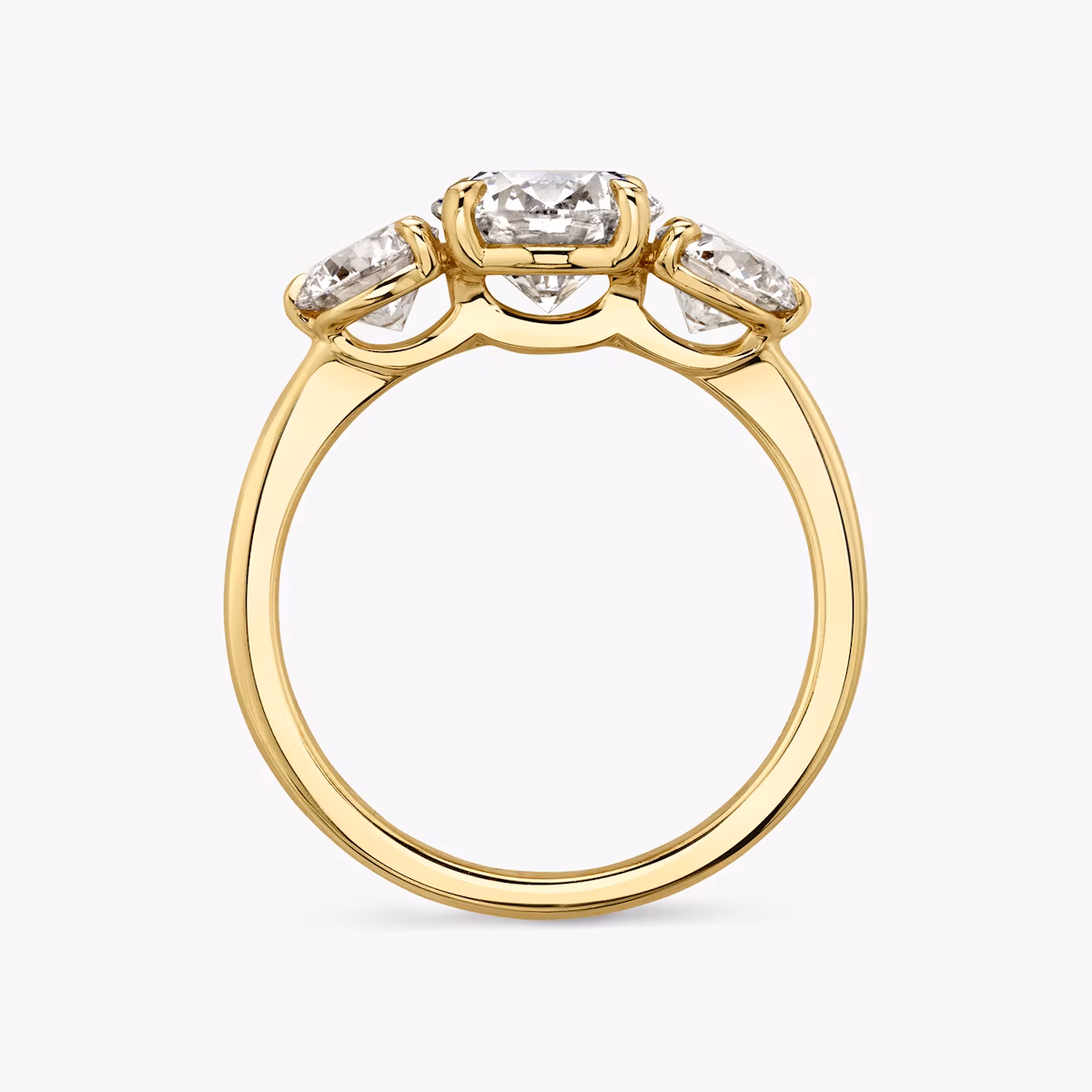 The Three Stone | Round Brilliant | 18k | Yellow Gold | bandAccent: Plain | caratWeight: other | sideStoneCarat: 0.50ct | sideStoneShape: Round Brilliant | diamondOrientation: vertical