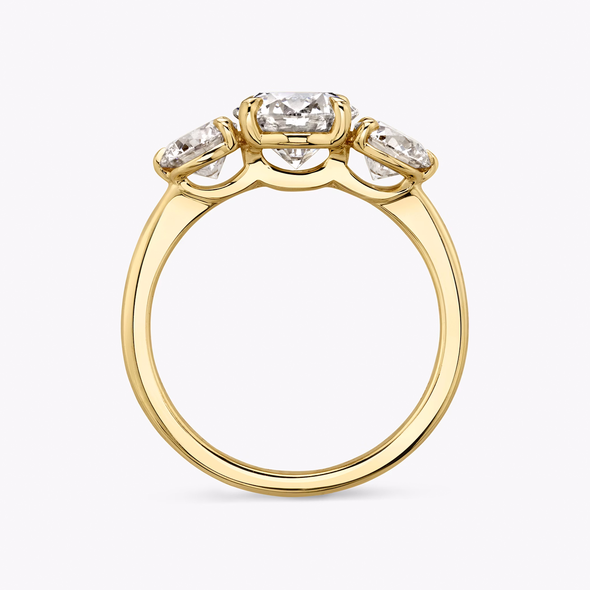 The Three Stone | Round Brilliant | 18k | Yellow Gold | bandAccent: Plain | caratWeight: other | sideStoneCarat: 0.50ct | sideStoneShape: Round Brilliant | diamondOrientation: vertical