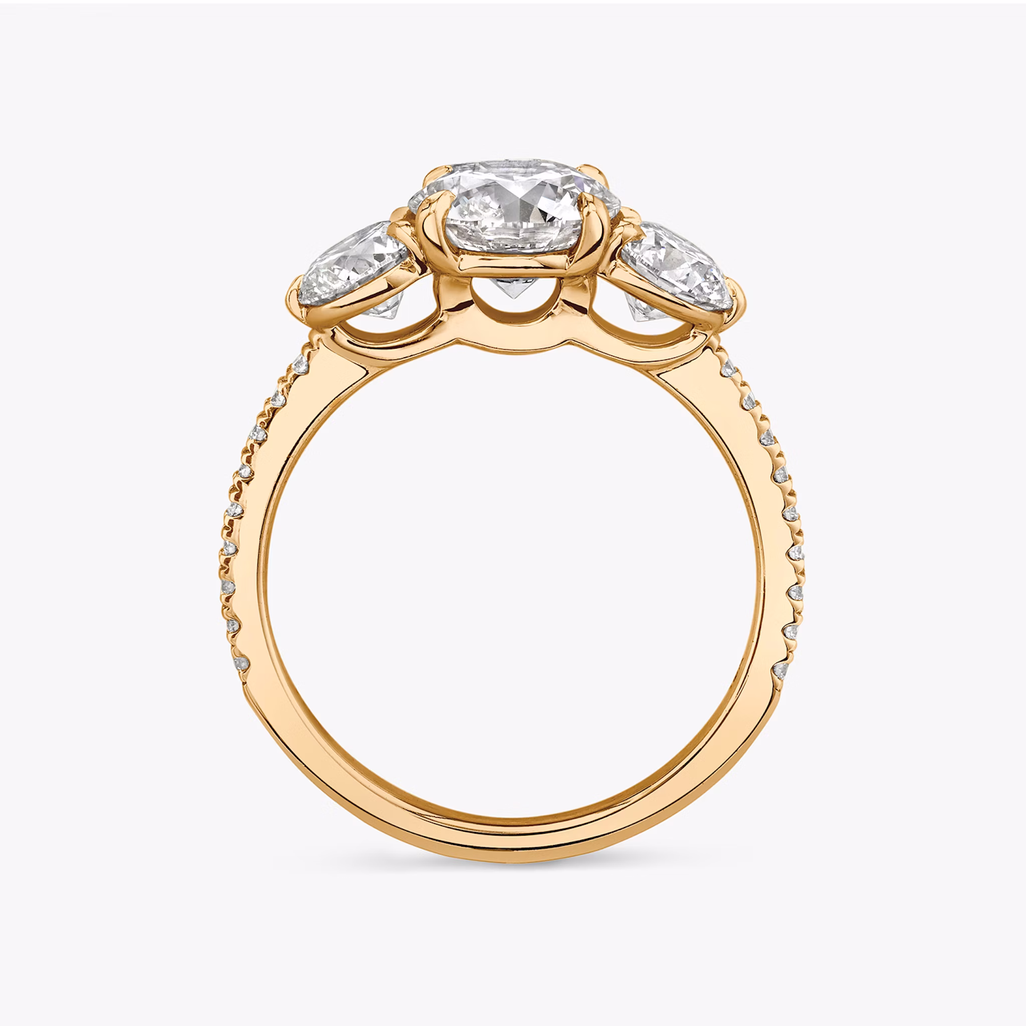 The Three Stone | Round Brilliant | 14k | Rose Gold | bandAccent: Pavé | caratWeight: other | sideStoneCarat: 0.50ct | sideStoneShape: Round Brilliant | diamondOrientation: vertical