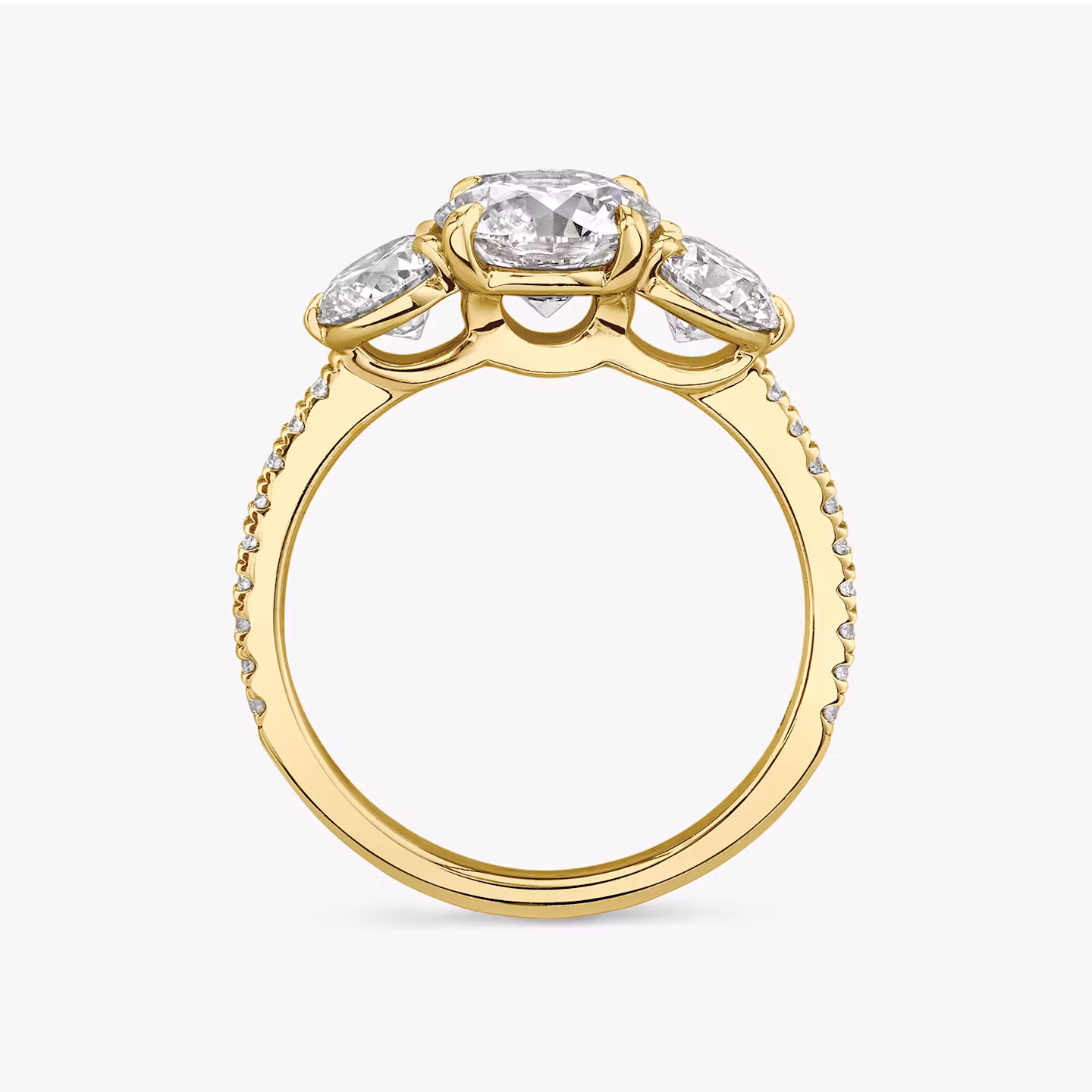 The Three Stone | Round Brilliant | 18k | Yellow Gold | bandAccent: Pavé | caratWeight: other | sideStoneCarat: 0.50ct | sideStoneShape: Round Brilliant | diamondOrientation: vertical