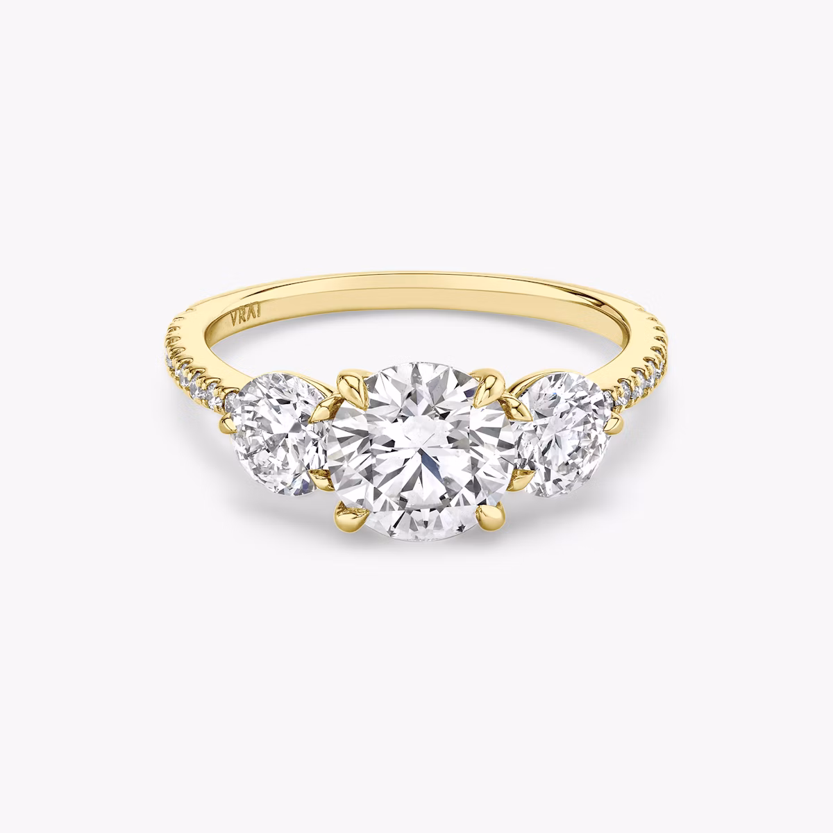 Three stone round brilliant ring