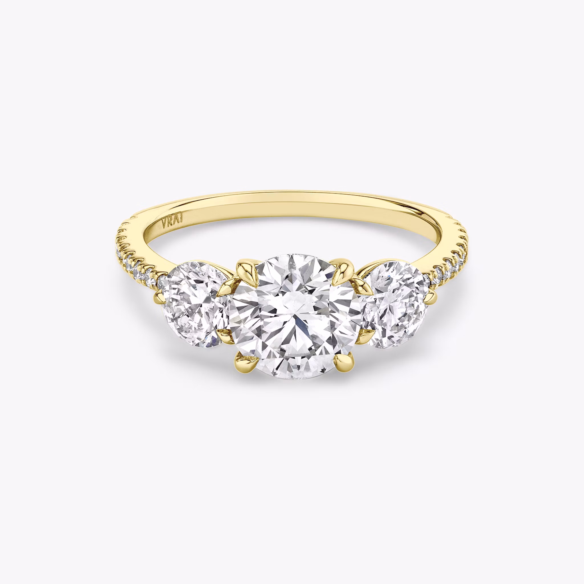 Three stone round brilliant ring