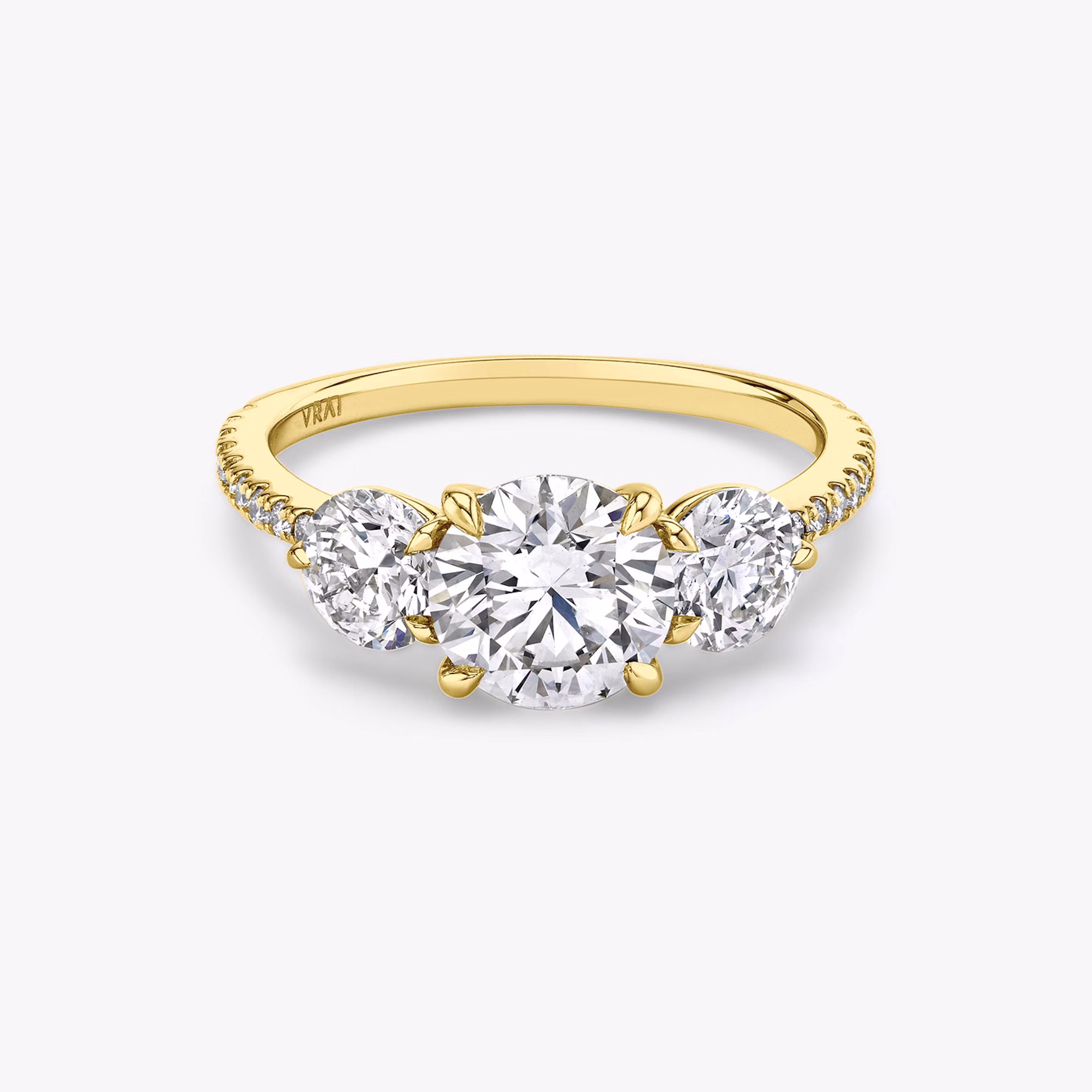 Three stone round brilliant ring