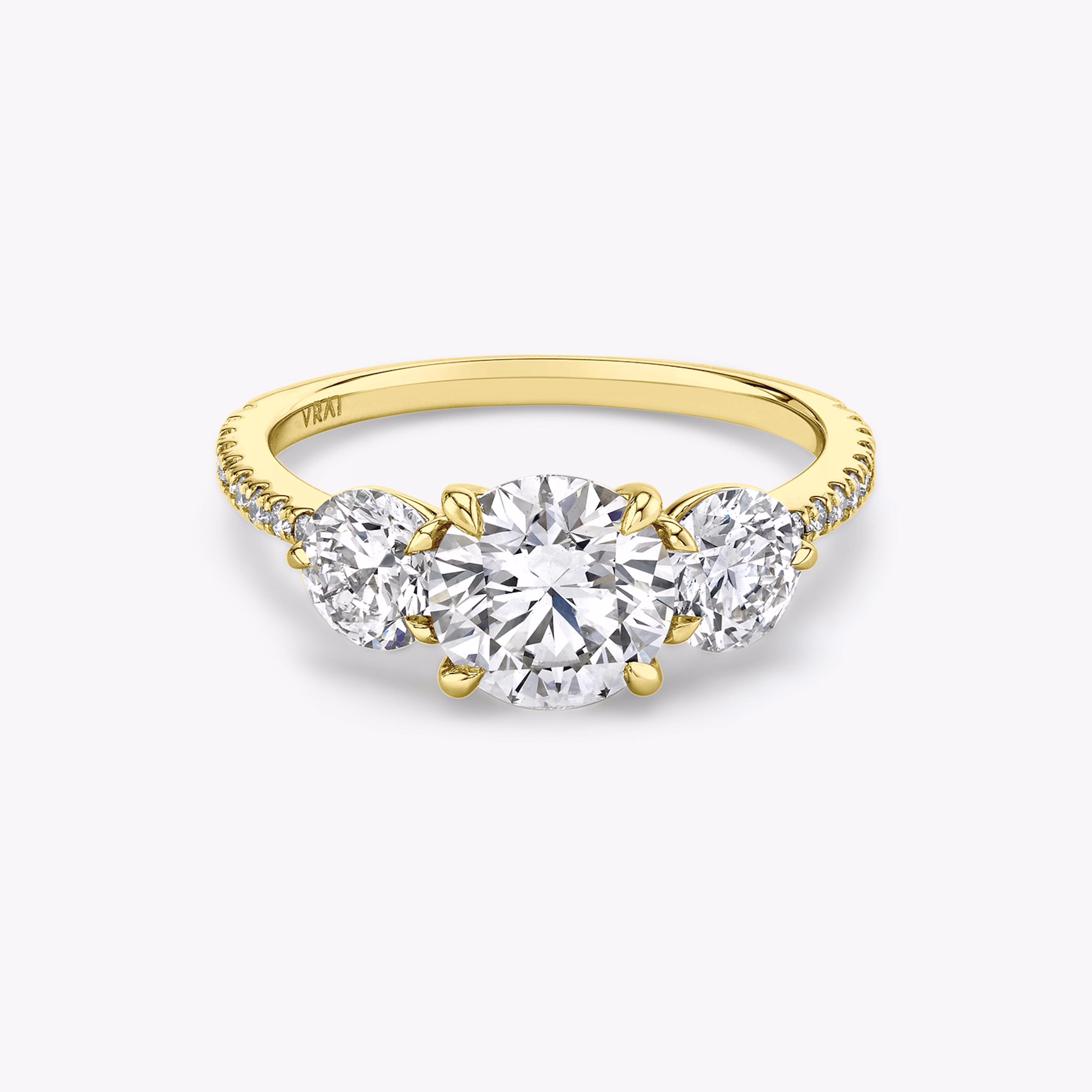 Three stone round brilliant ring
