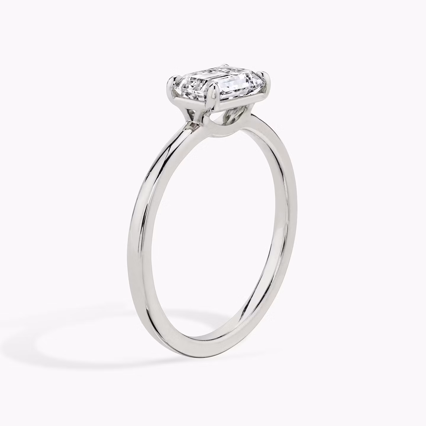 Signature | Emerald | Platin | bandAccent: Ohne Pavé-Besatz | bandWidth: standard | diamondOrientation: horizontal | hiddenHalo: no | caratWeight: other