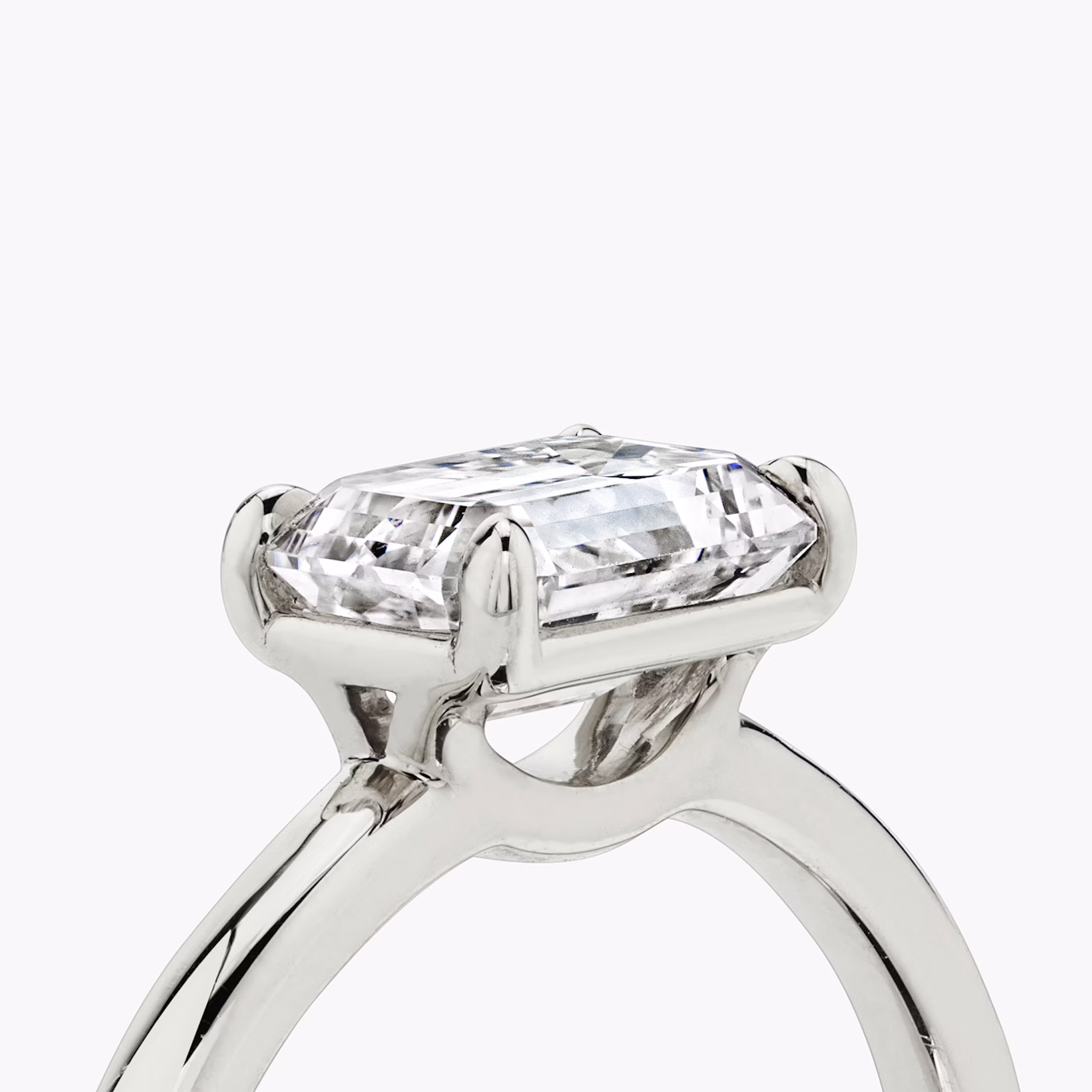 The Signature | Emerald | Platinum | bandAccent: Plain | bandWidth: standard | diamondOrientation: horizontal | hiddenHalo: no | caratWeight: other