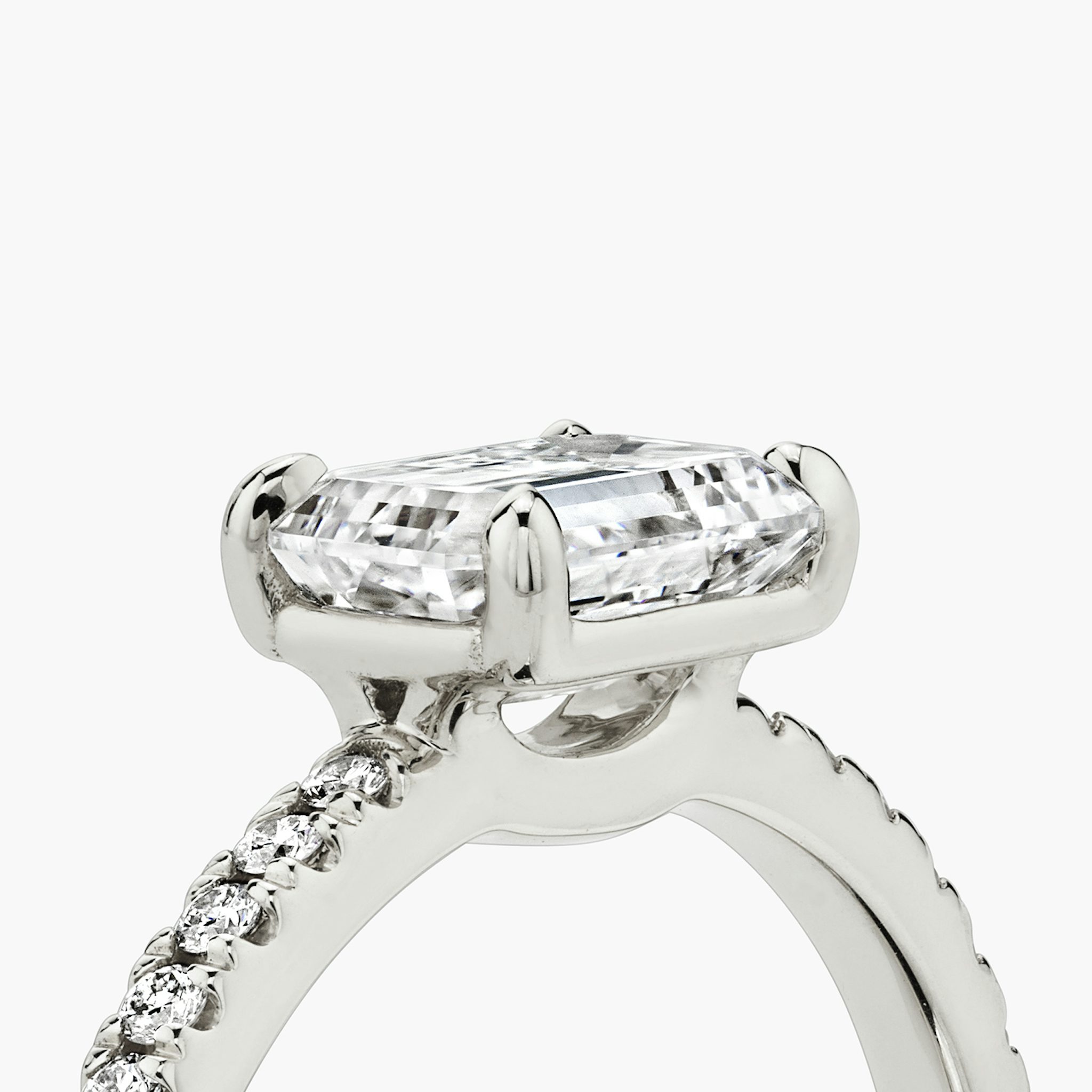 The Signature | Emerald | Platinum | bandAccent: Pavé | bandWidth: standard | diamondOrientation: horizontal | hiddenHalo: no | caratWeight: other