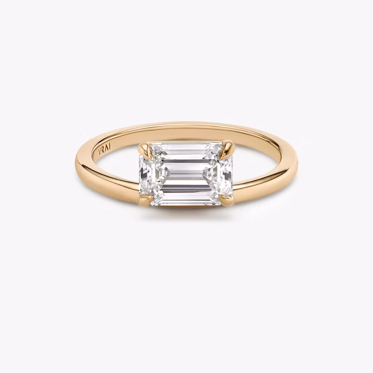 Front view of the Hover solitaire engagement ring in 18k rose gold with a 1.5ct emerald cut VRAI created diamond