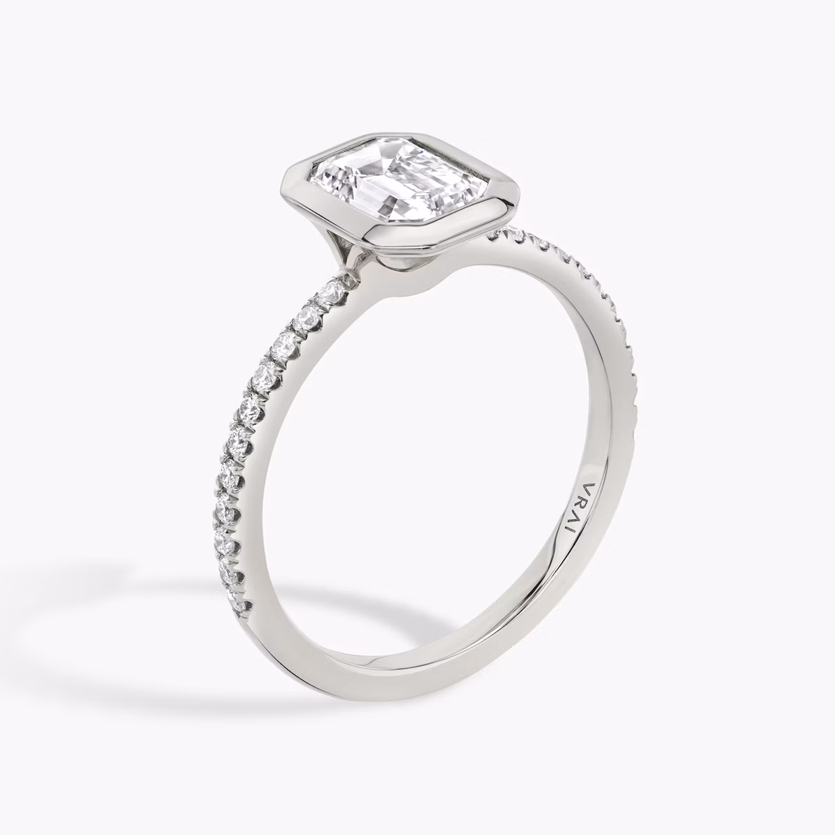 The Signature Bezel | Emerald | Platinum | bandAccent: Pavé | diamondOrientation: vertical | caratWeight: other
