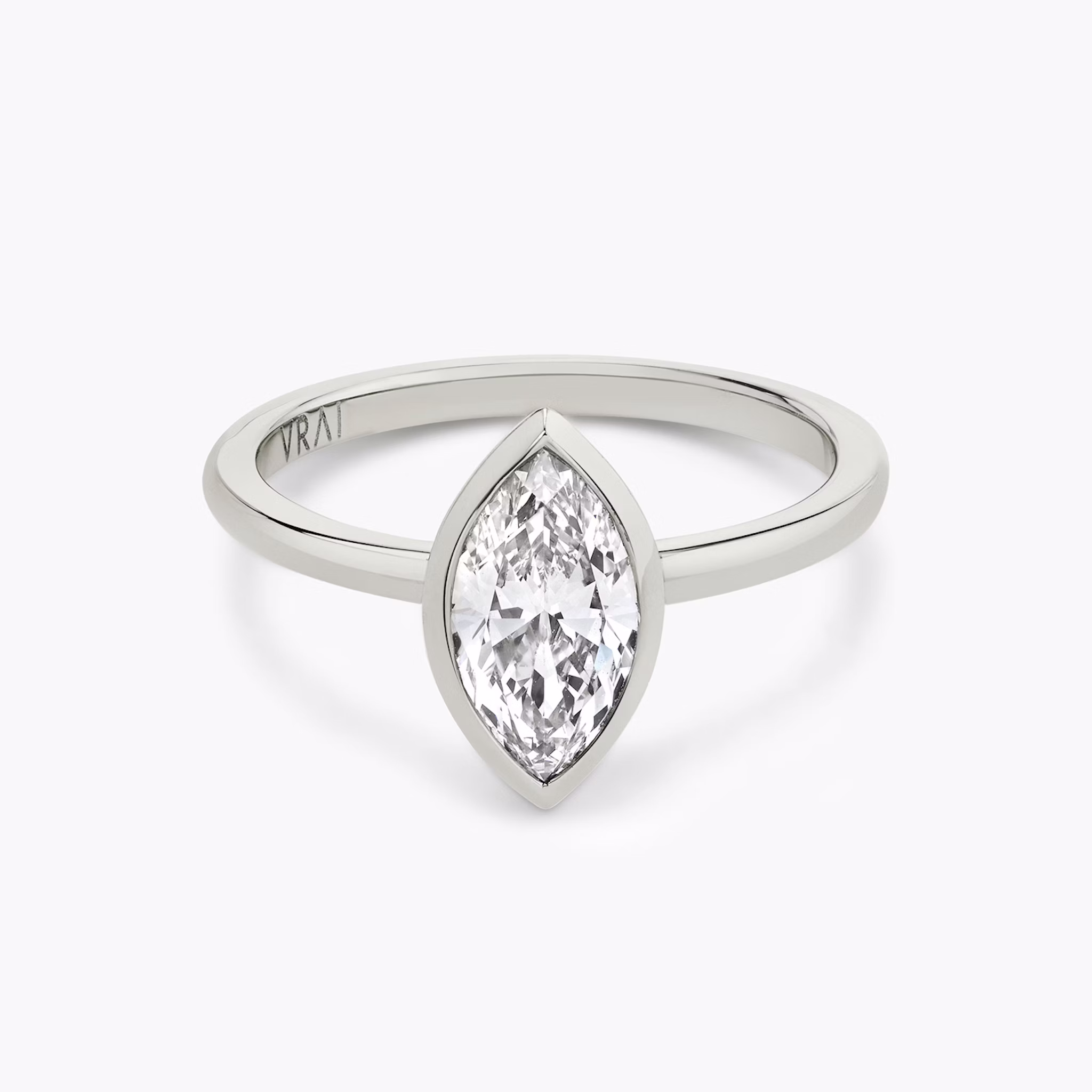 The Signature Bezel | Marquise | Platinum | bandAccent: Plain | diamondOrientation: vertical | caratWeight: other