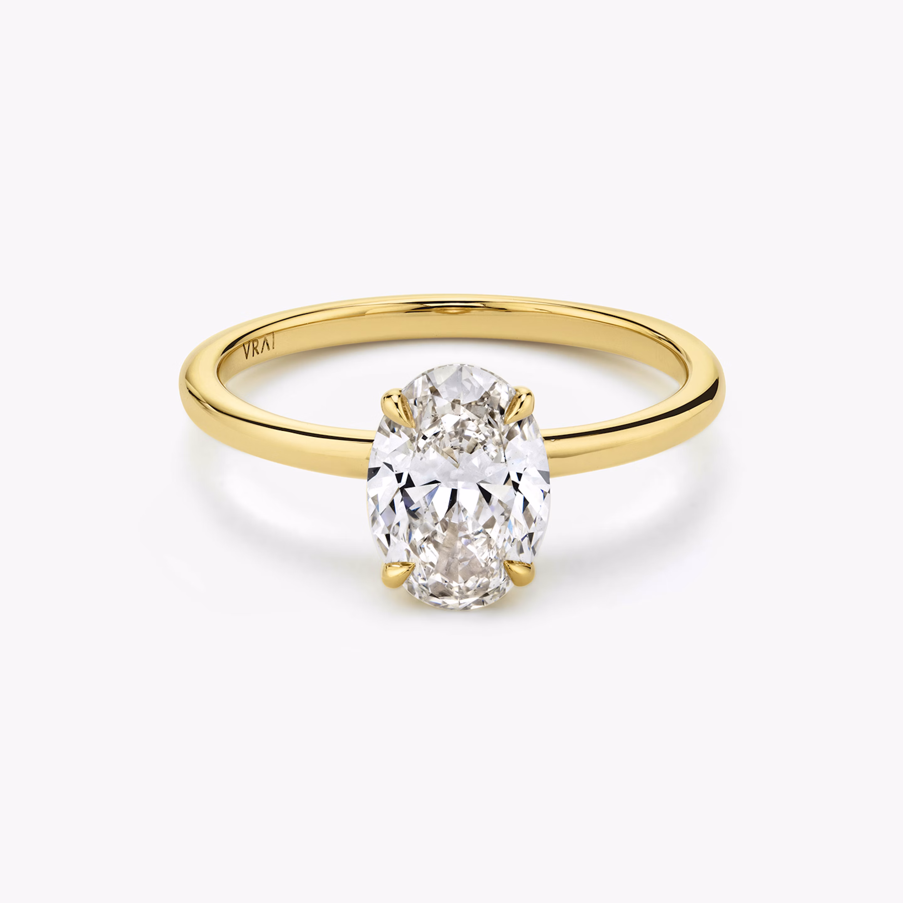 an engagement ring with oval cut diamond
