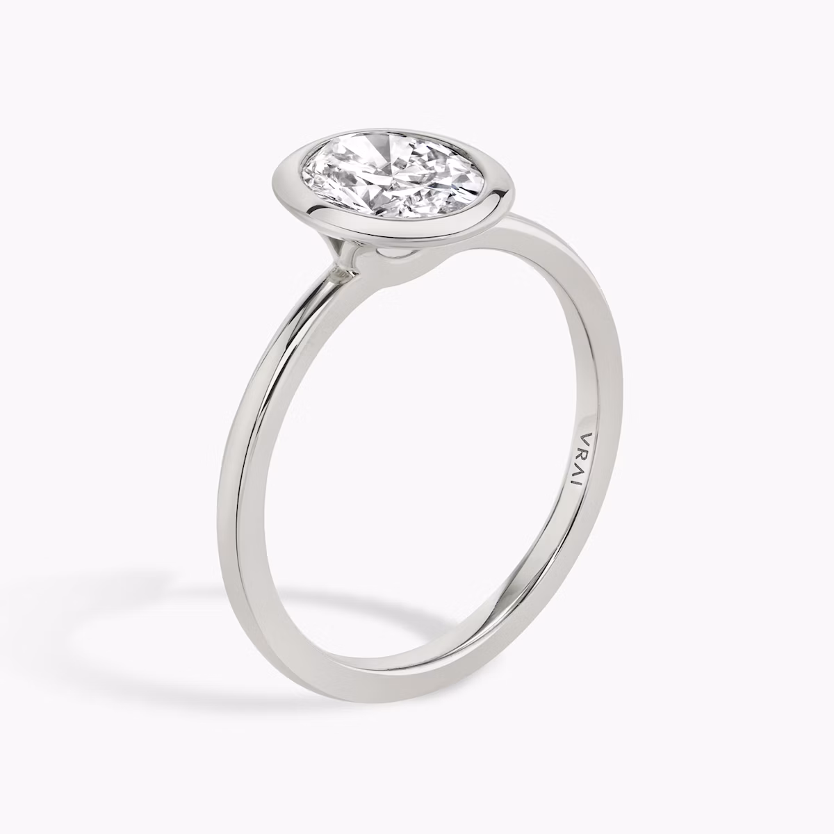 The Signature Bezel | Oval | 18k | White Gold | bandAccent: Plain | diamondOrientation: vertical | caratWeight: other