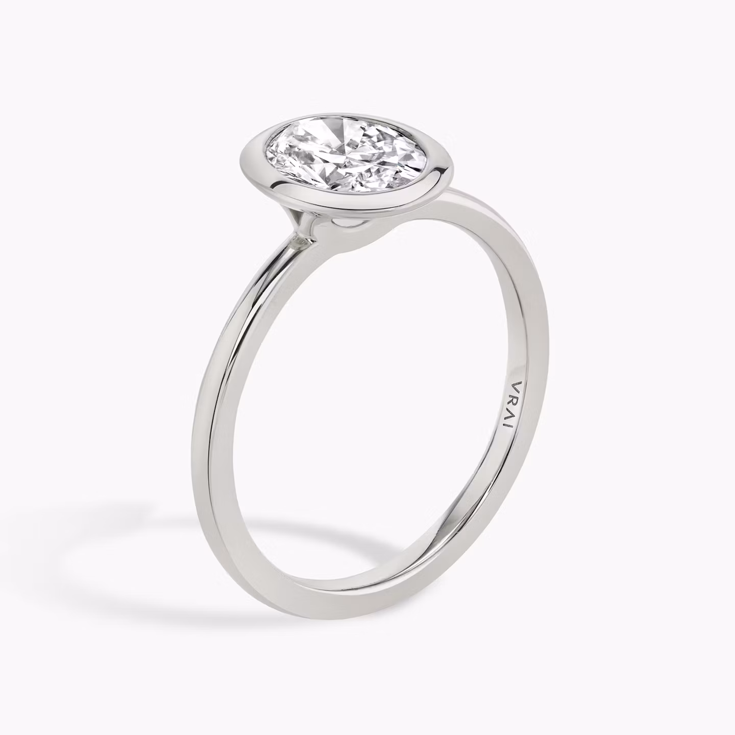 The Signature Bezel | Oval | 18k | White Gold | bandAccent: Plain | diamondOrientation: vertical | caratWeight: other