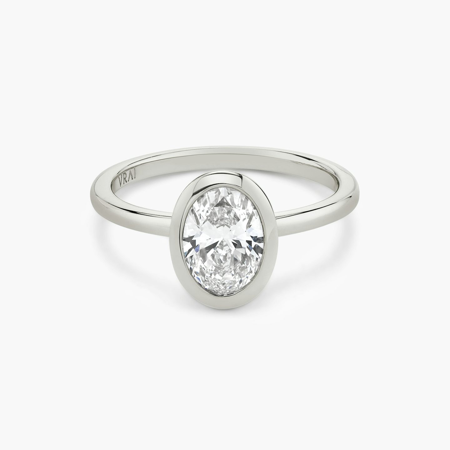 The Signature Bezel | Oval | Platinum | bandAccent: Plain | diamondOrientation: vertical | caratWeight: other