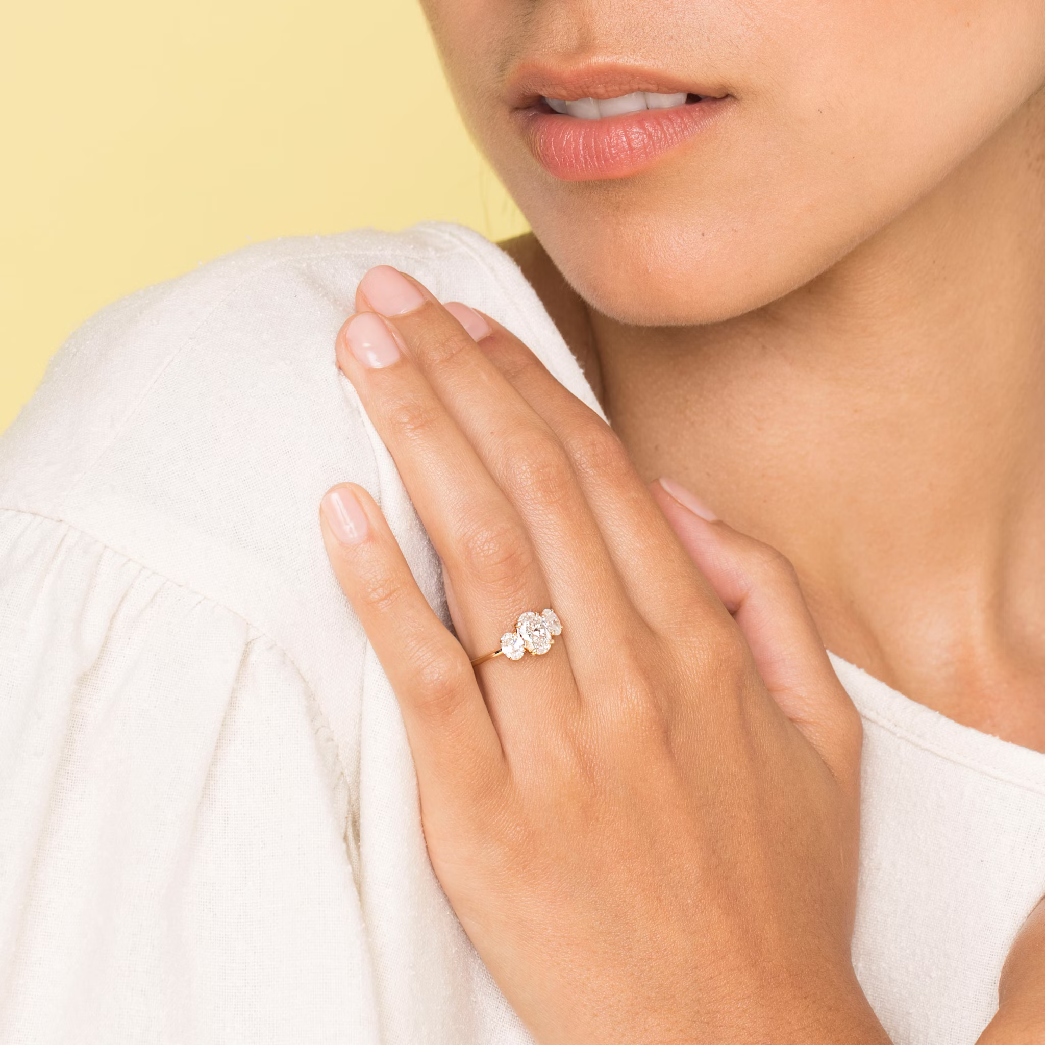 The Three Stone | Oval | 14k | Rose Gold | bandAccent: Plain | sideStoneCarat: 0.25ct | sideStoneShape: Oval | diamondOrientation: vertical | caratWeight: other