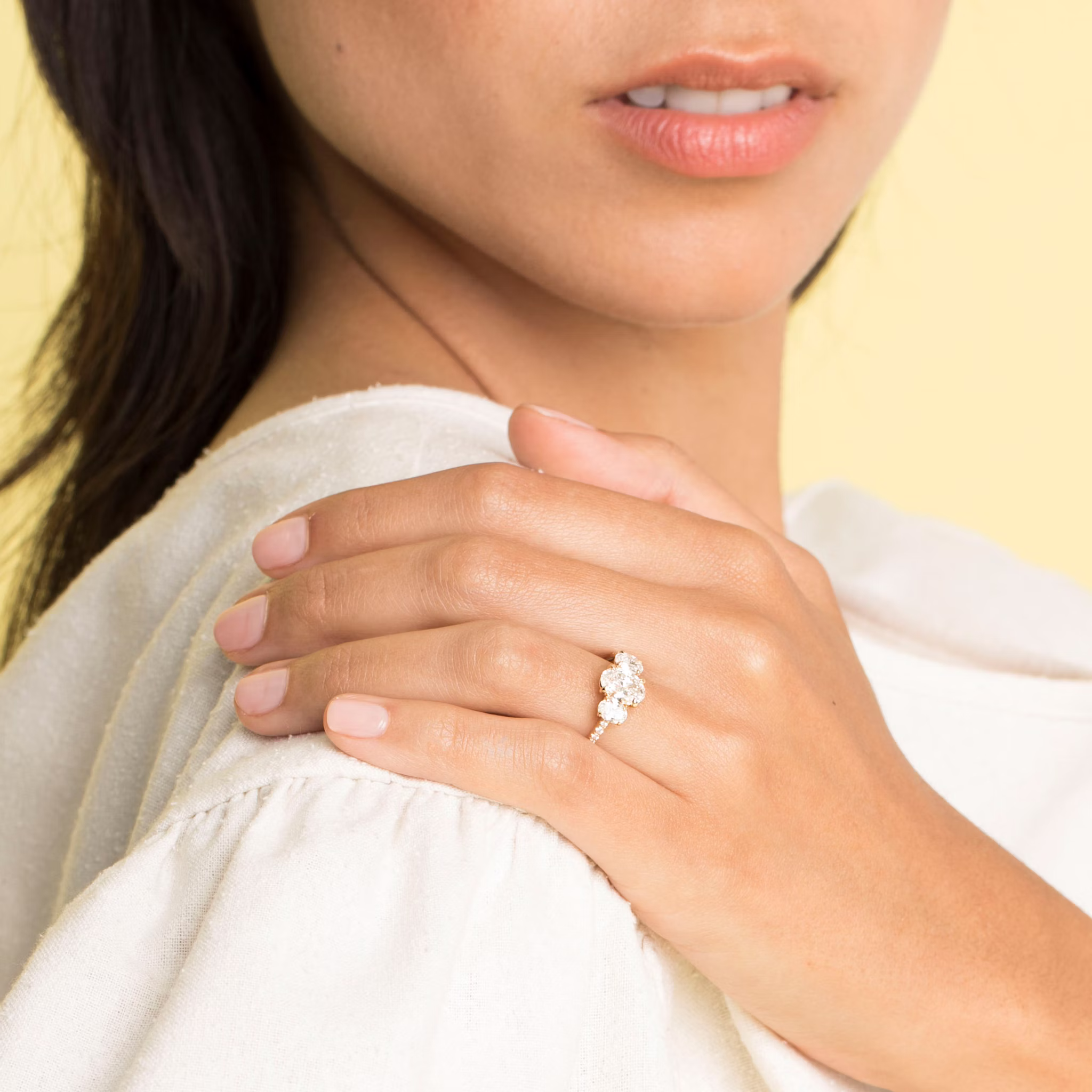 The Three Stone | Oval | Platinum | bandAccent: Pavé | sideStoneCarat: 0.25ct | sideStoneShape: Oval | diamondOrientation: vertical | caratWeight: other