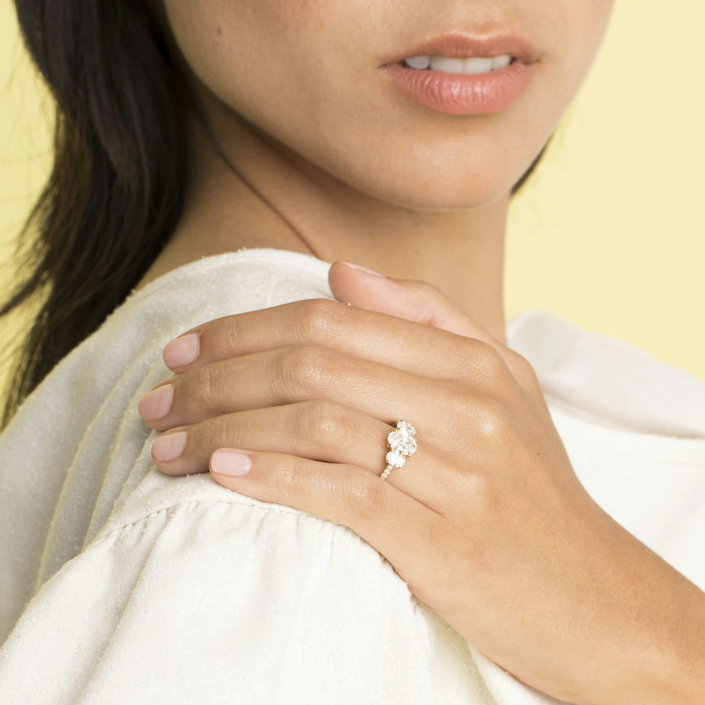 The Three Stone | Oval | 18k | Yellow Gold | bandAccent: Pavé | sideStoneCarat: 0.25ct | sideStoneShape: Oval | diamondOrientation: vertical | caratWeight: other