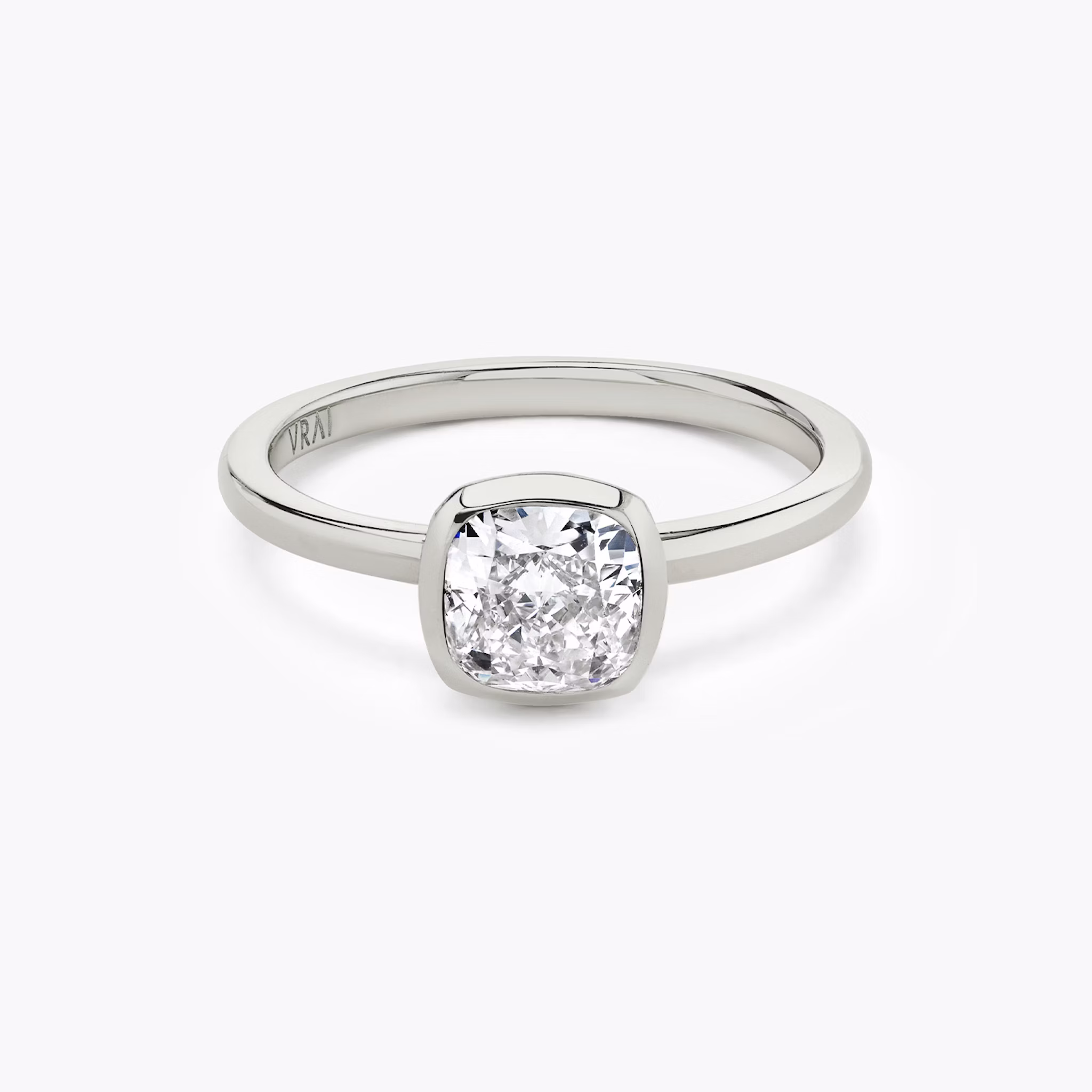 The Signature Bezel | Cushion | Platinum | bandAccent: Plain | diamondOrientation: vertical | caratWeight: other