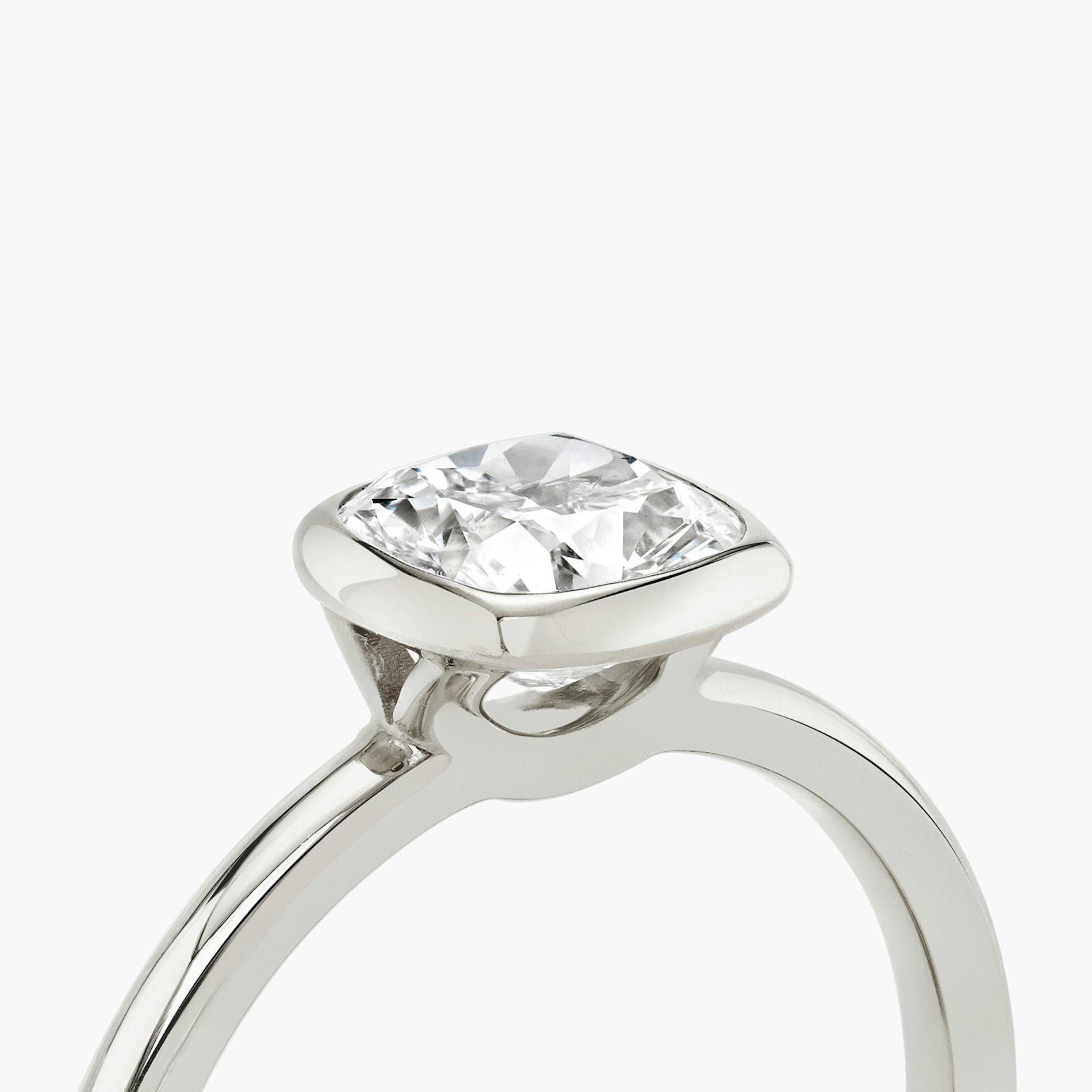 The Signature Bezel | Cushion | Platinum | bandAccent: Plain | diamondOrientation: vertical | caratWeight: other