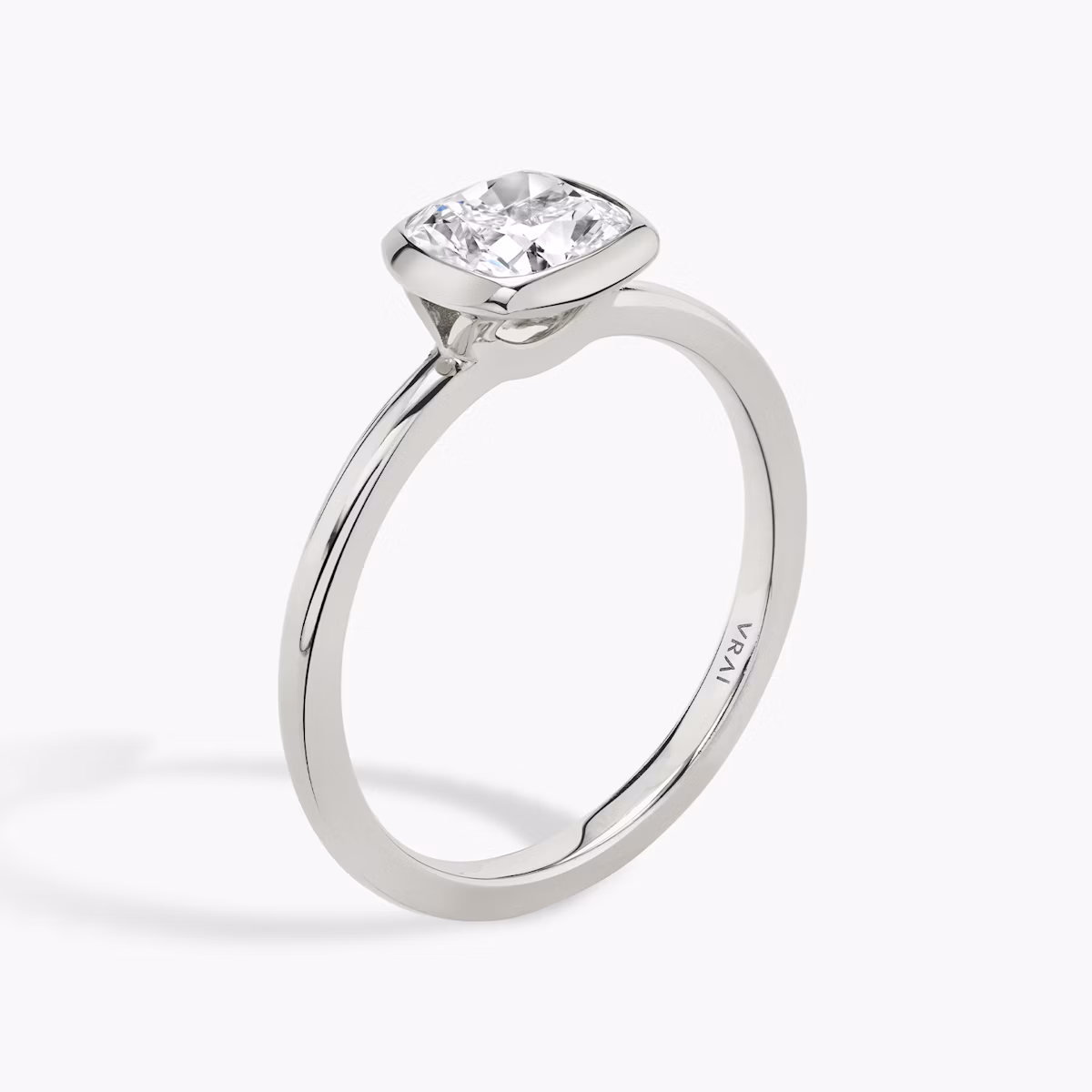 The Signature Bezel | Cushion | Platinum | bandAccent: Plain | diamondOrientation: vertical | caratWeight: other