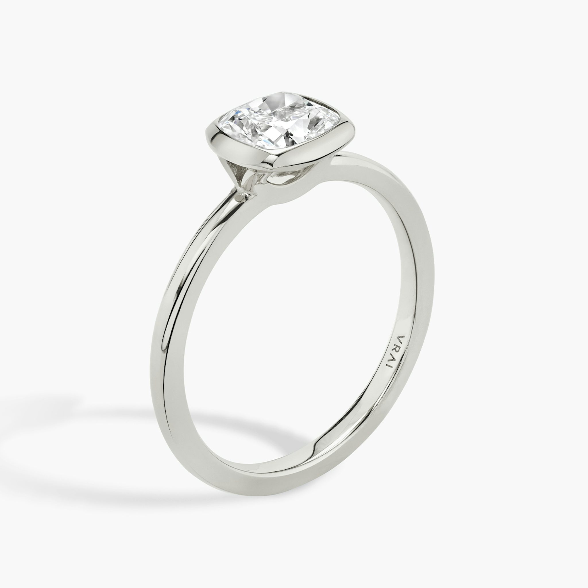 The Signature Bezel | Cushion | 18k | White Gold | bandAccent: Plain | diamondOrientation: vertical | caratWeight: other