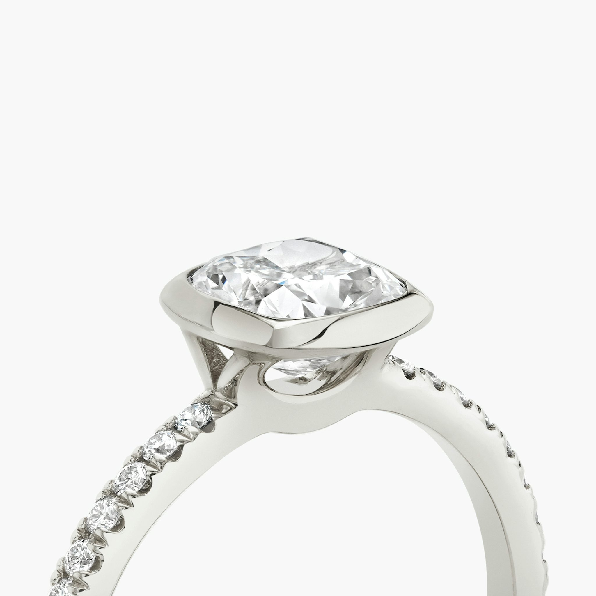 The Signature Bezel | Cushion | Platinum | bandAccent: Pavé | diamondOrientation: horizontal | caratWeight: other