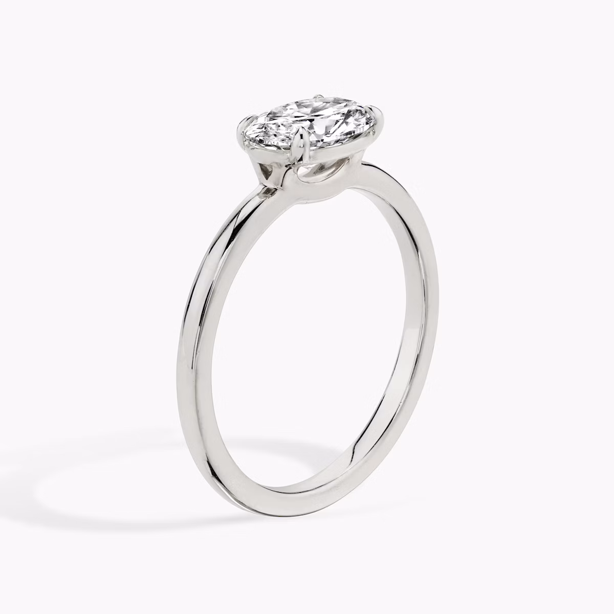 The Signature | Oval | Platinum | bandAccent: Plain | bandWidth: standard | diamondOrientation: horizontal | hiddenHalo: no | caratWeight: other