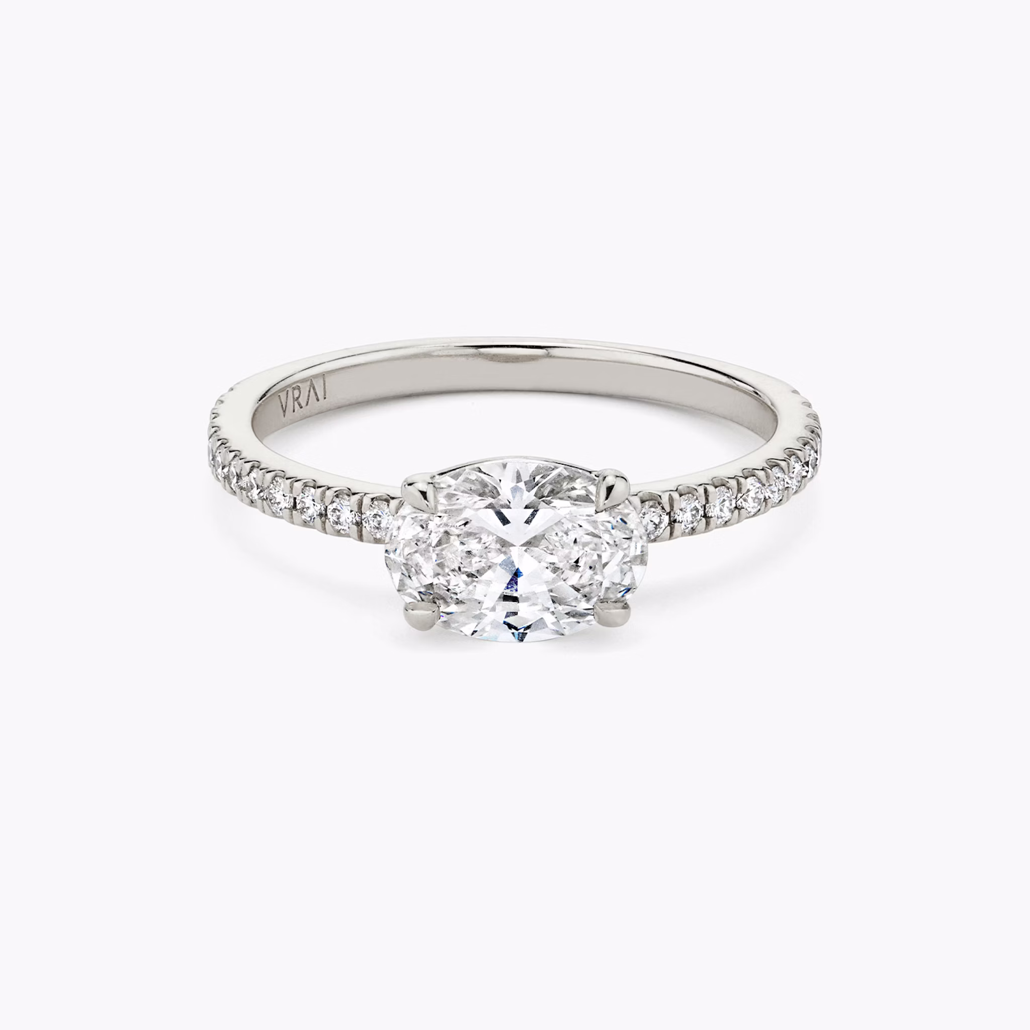 The Signature | Oval | 18k | White Gold | bandAccent: Pavé | bandWidth: standard | diamondOrientation: horizontal | hiddenHalo: no | caratWeight: other