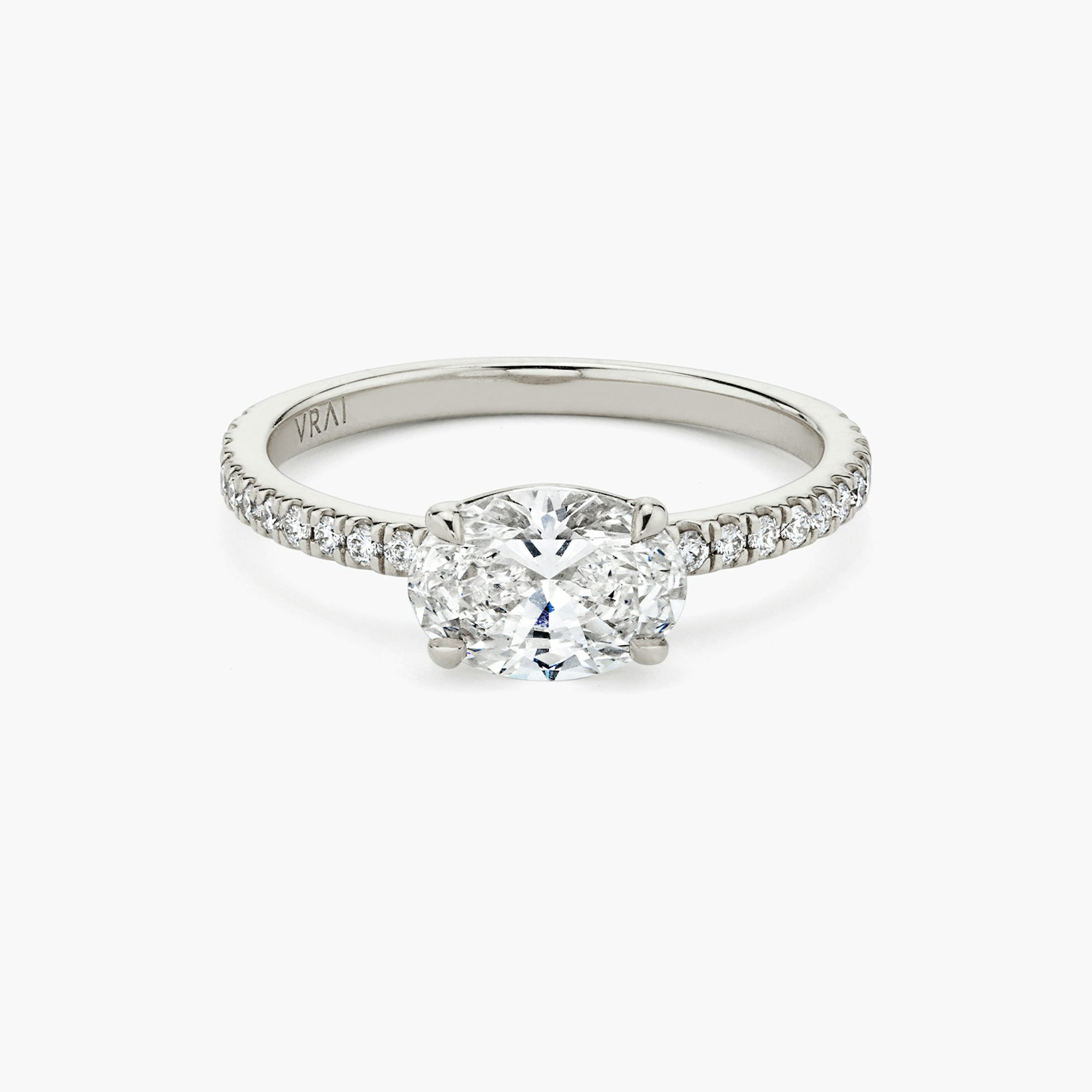 The Signature | Oval | 18k | White Gold | bandAccent: Pavé | bandWidth: standard | diamondOrientation: horizontal | hiddenHalo: no | caratWeight: other