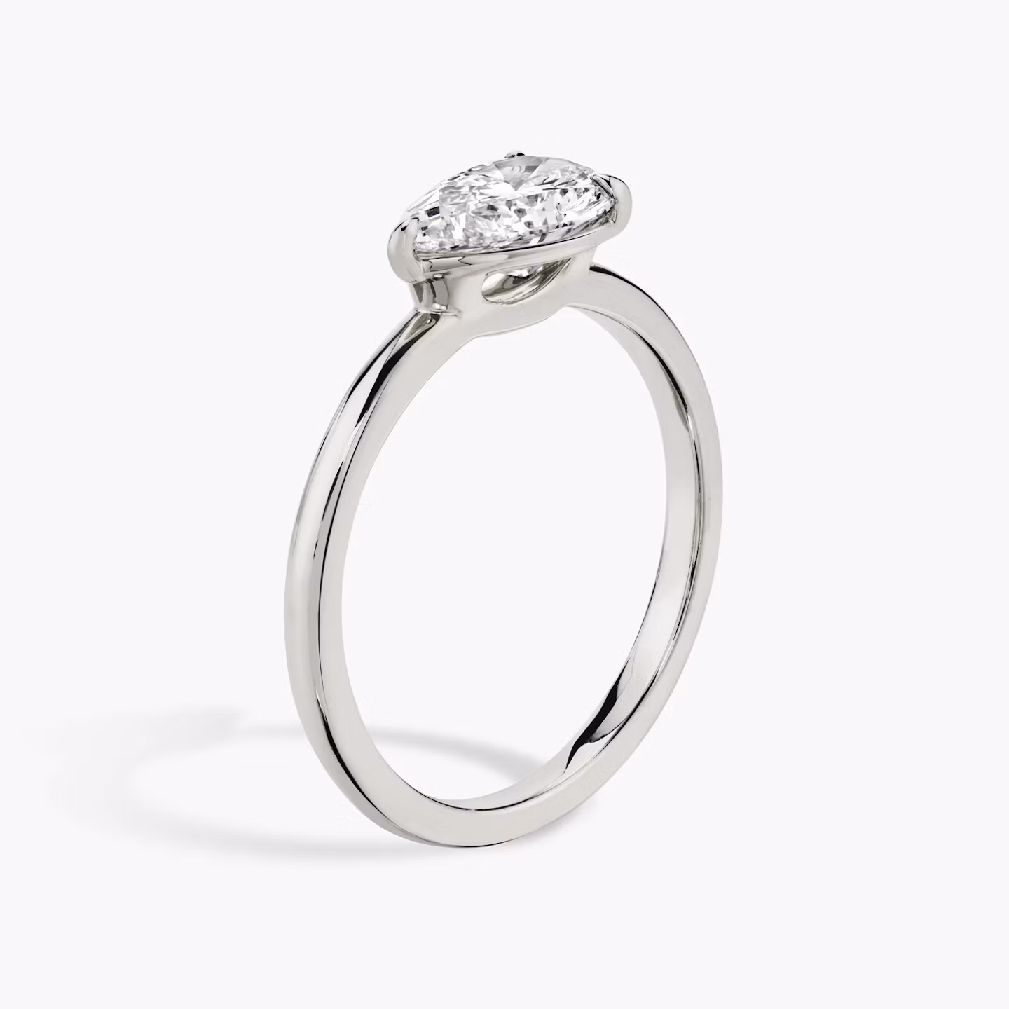 The Signature | Pear | Platinum | bandAccent: Plain | bandWidth: standard | diamondOrientation: horizontal | hiddenHalo: no | caratWeight: other