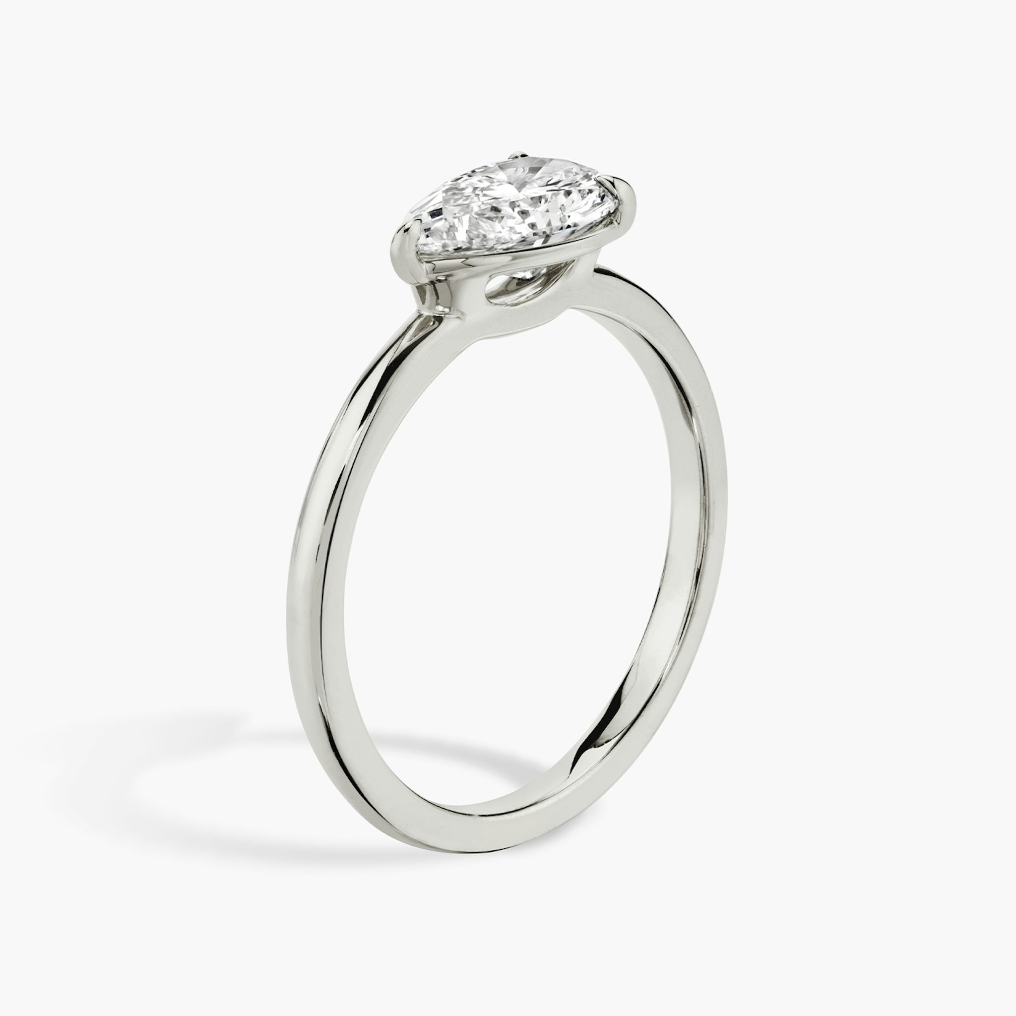 The Signature | Pear | Platinum | bandAccent: Plain | bandWidth: standard | diamondOrientation: horizontal | hiddenHalo: no | caratWeight: other