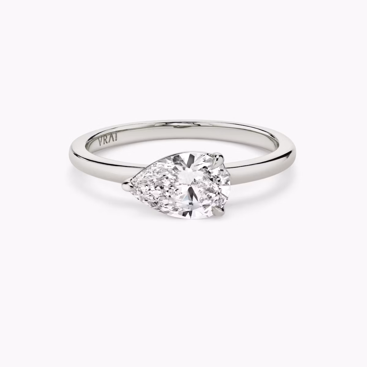 The Signature | Pear | Platinum | bandAccent: Plain | bandWidth: standard | diamondOrientation: horizontal | hiddenHalo: no | caratWeight: other