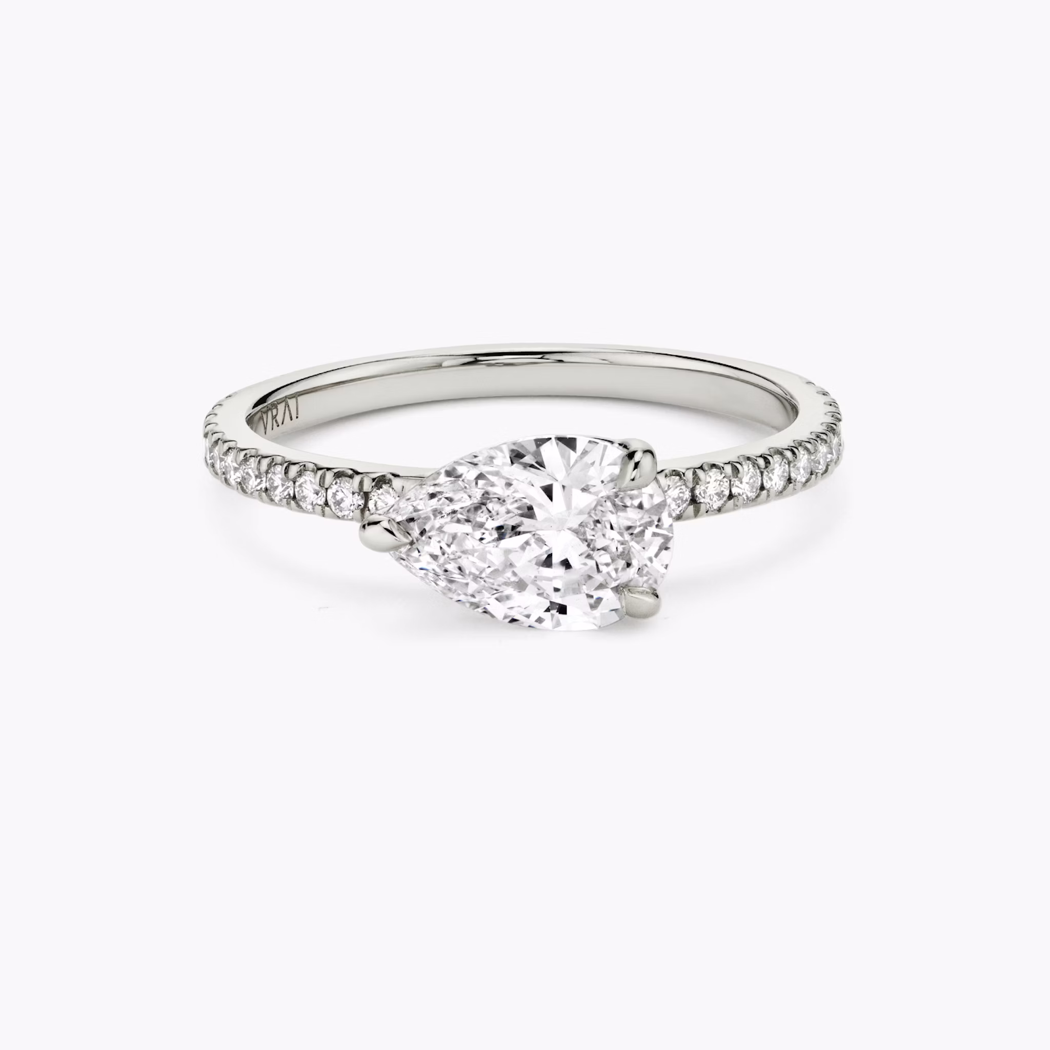 The Signature | Pear | Platinum | bandAccent: Pavé | bandWidth: standard | diamondOrientation: horizontal | hiddenHalo: no | caratWeight: other