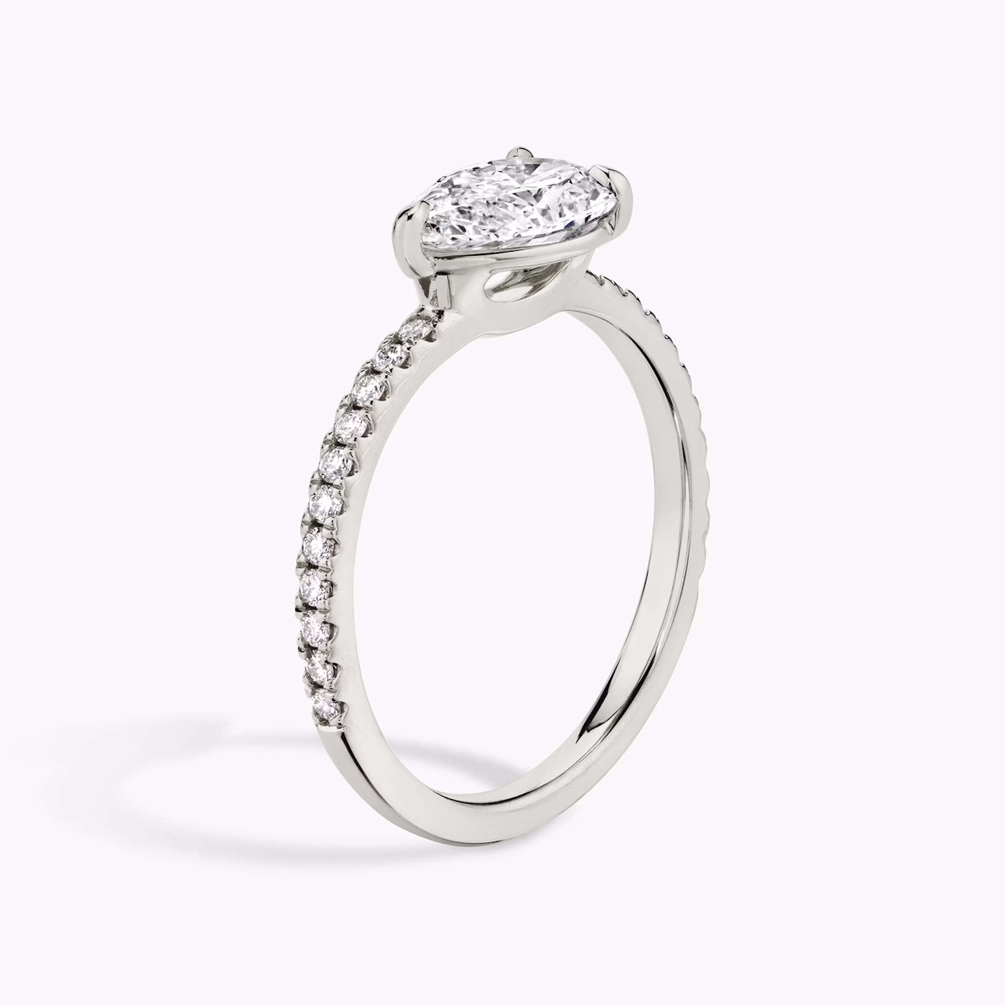 The Signature | Pear | 18k | White Gold | bandAccent: Pavé | bandWidth: standard | diamondOrientation: horizontal | hiddenHalo: no | caratWeight: other