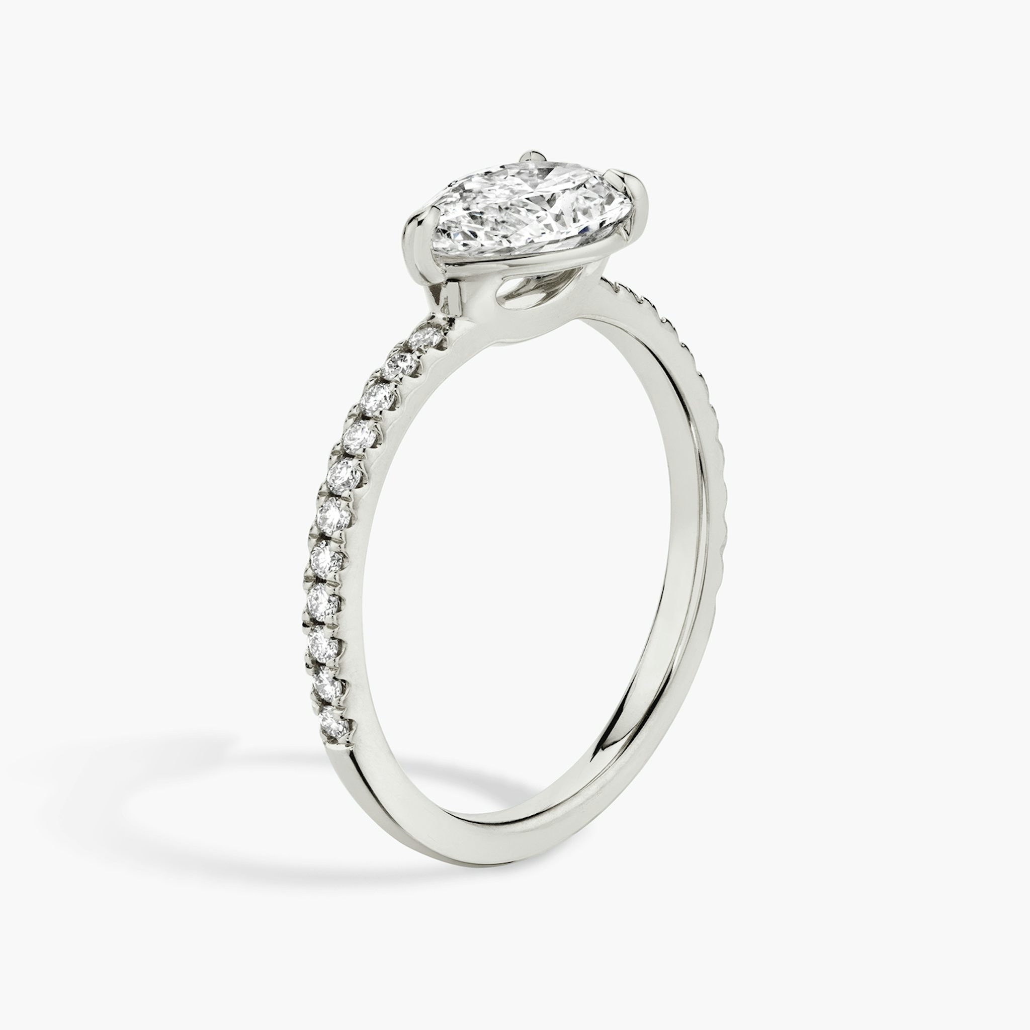 The Signature | Pear | 18k | White Gold | bandAccent: Pavé | bandWidth: standard | diamondOrientation: horizontal | hiddenHalo: no | caratWeight: other