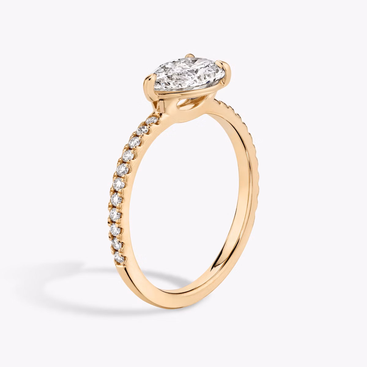 The Signature | Pear | 14k | Rose Gold | bandAccent: Pavé | bandWidth: standard | diamondOrientation: horizontal | hiddenHalo: no | caratWeight: other