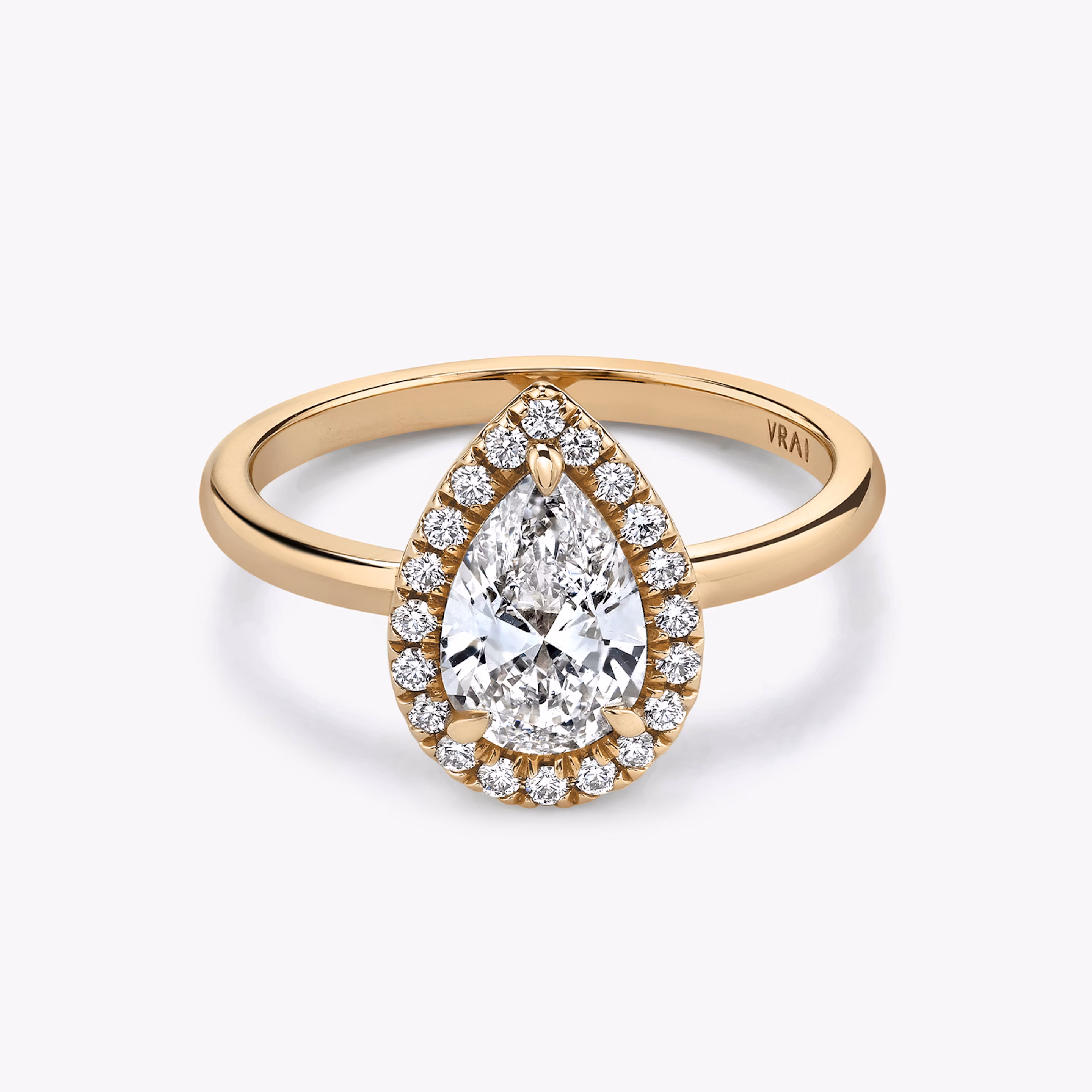 Halo Pear cut diamond ring