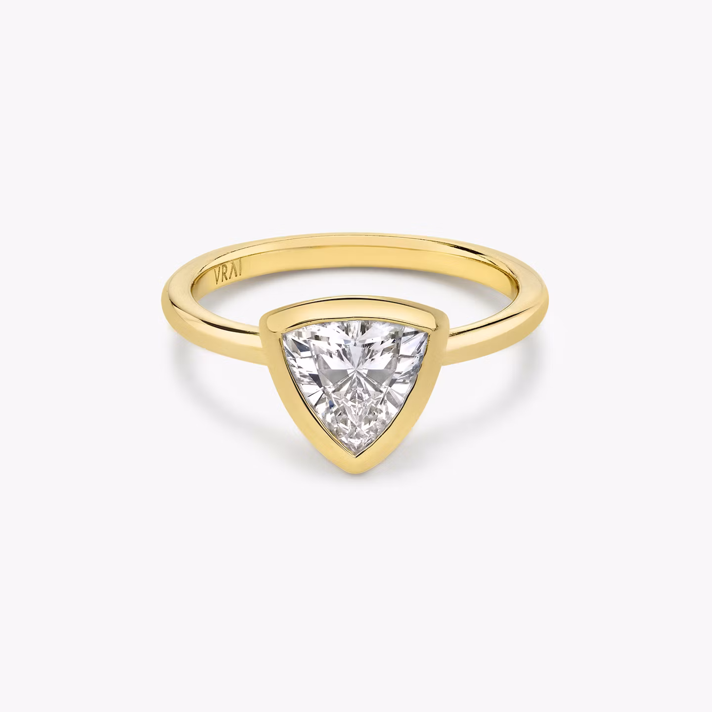 The Signature Bezel Trillion | Yellow Gold
