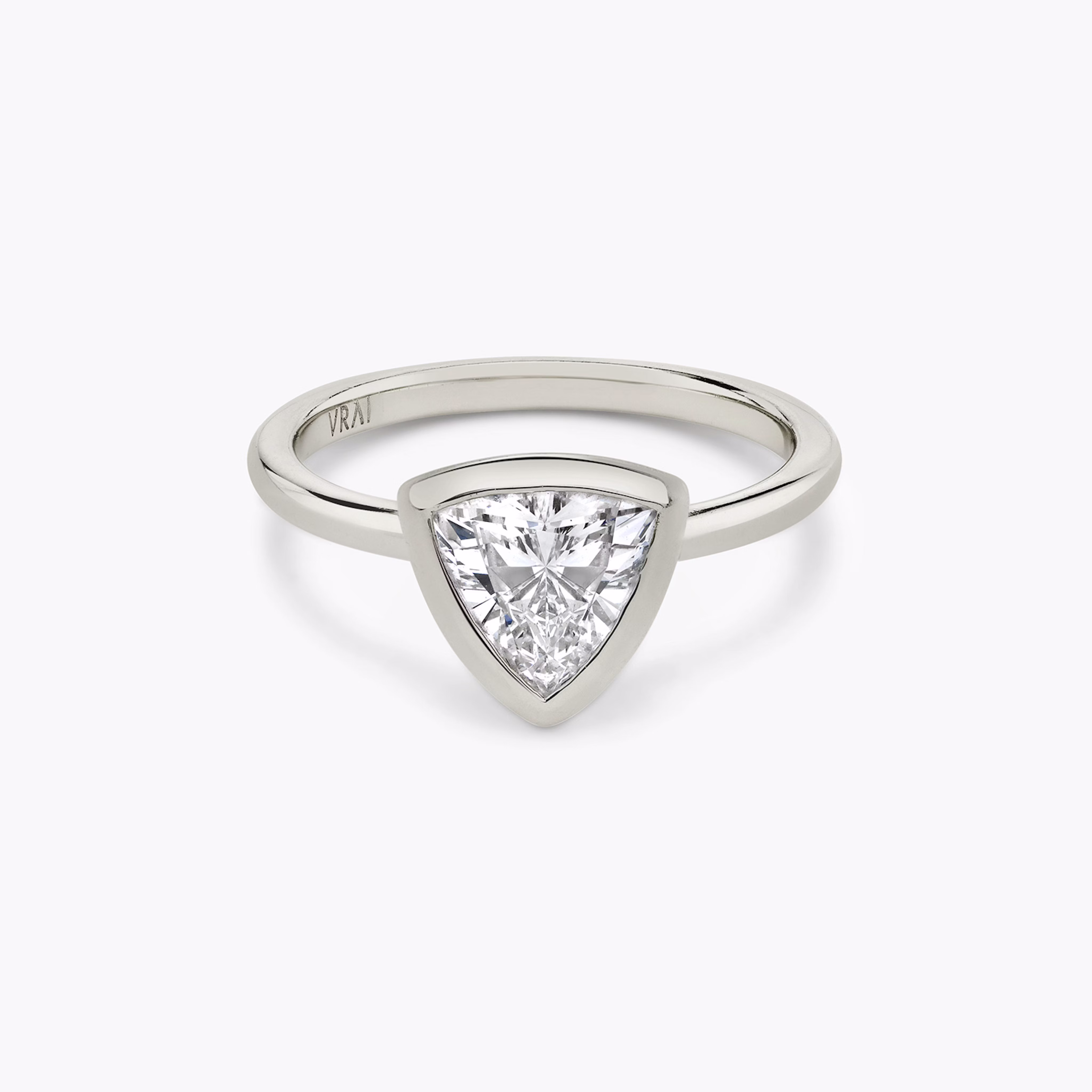 The Bezel Trillion Engagement Ring