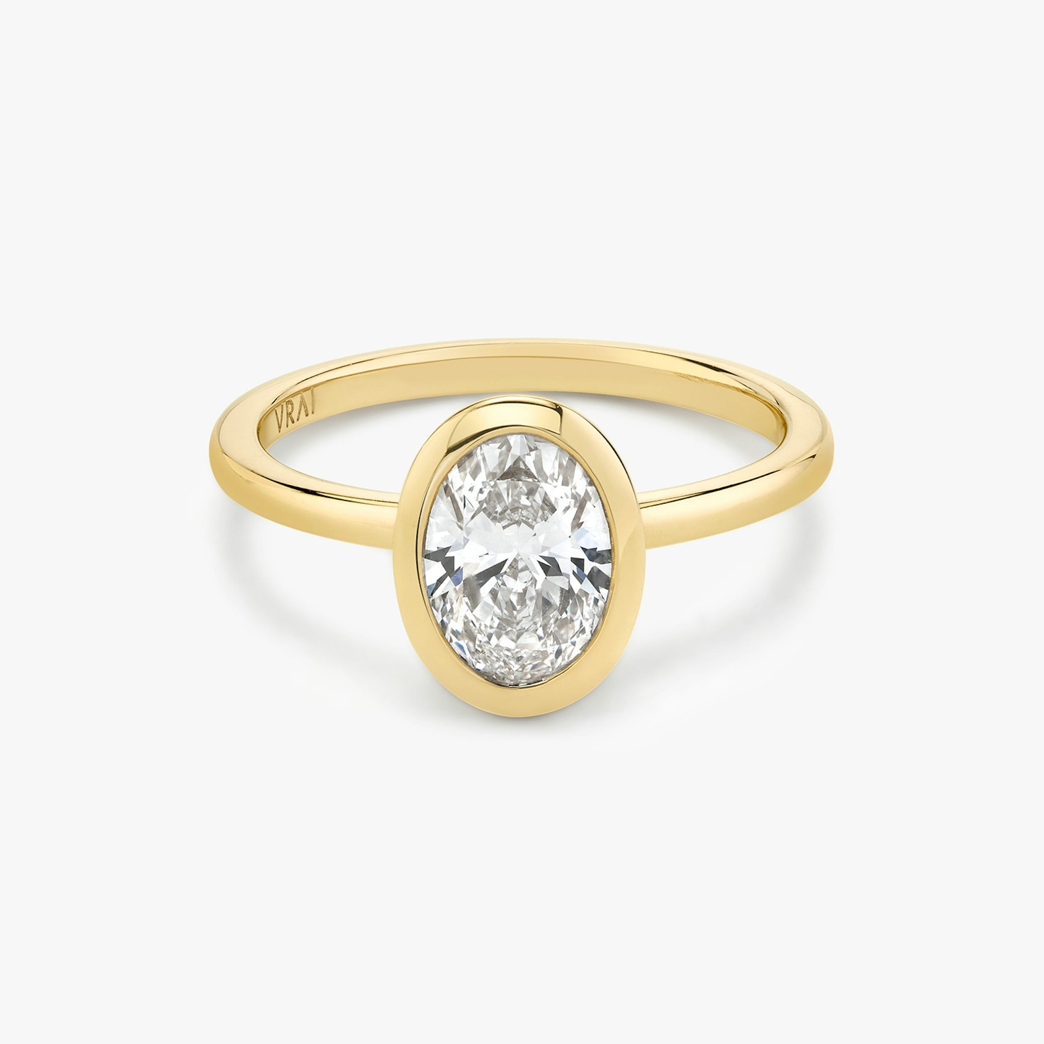 The Signature Bezel | Oval | 18k | Yellow Gold | bandAccent: Plain | diamondOrientation: vertical | caratWeight: other